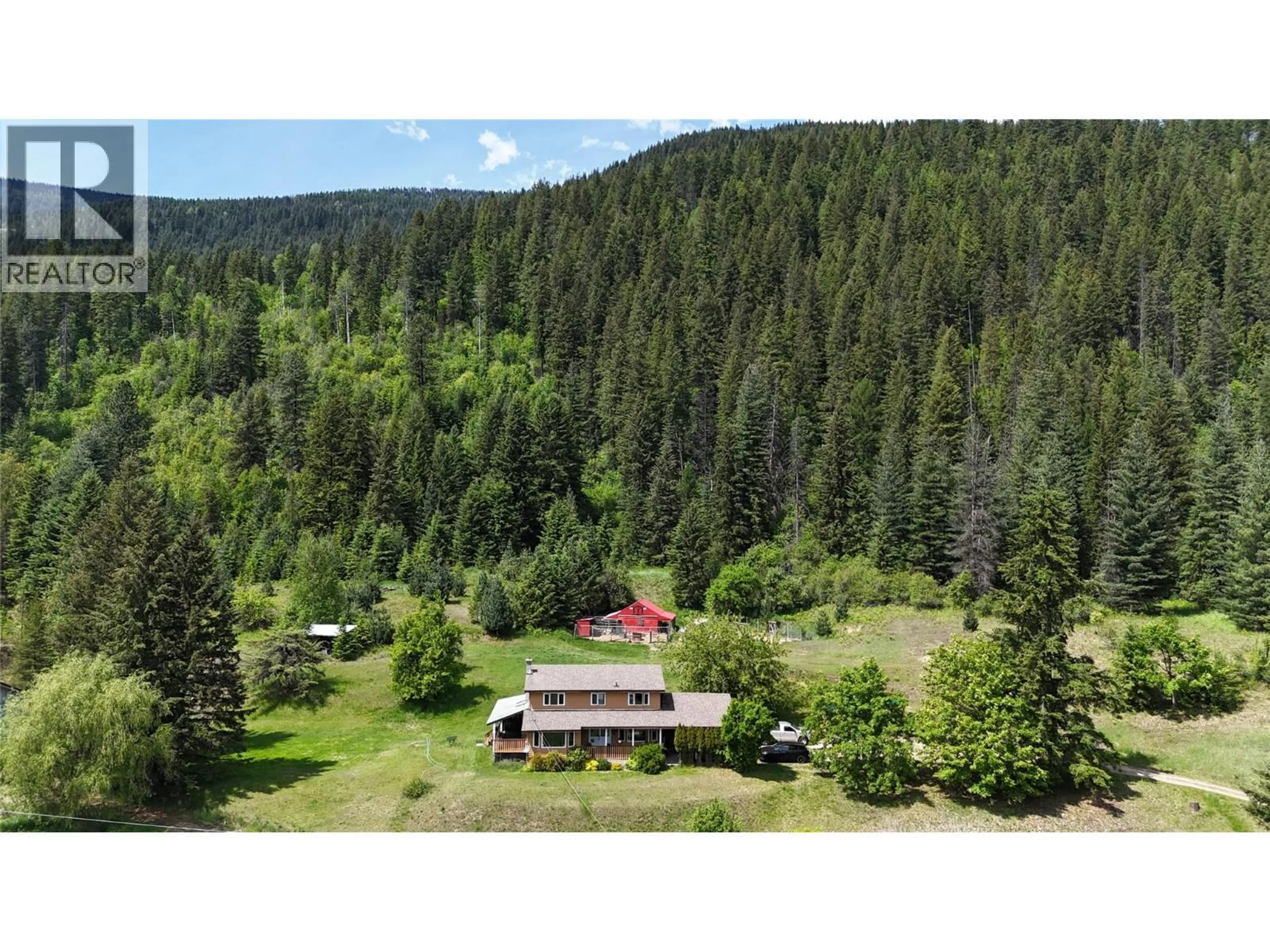 A pic from outside/outdoor area/front of a property/back of a property/a pic from drone, mountain view for 6785 PERRYS BACK ROAD, Appledale British Columbia V0G2J0