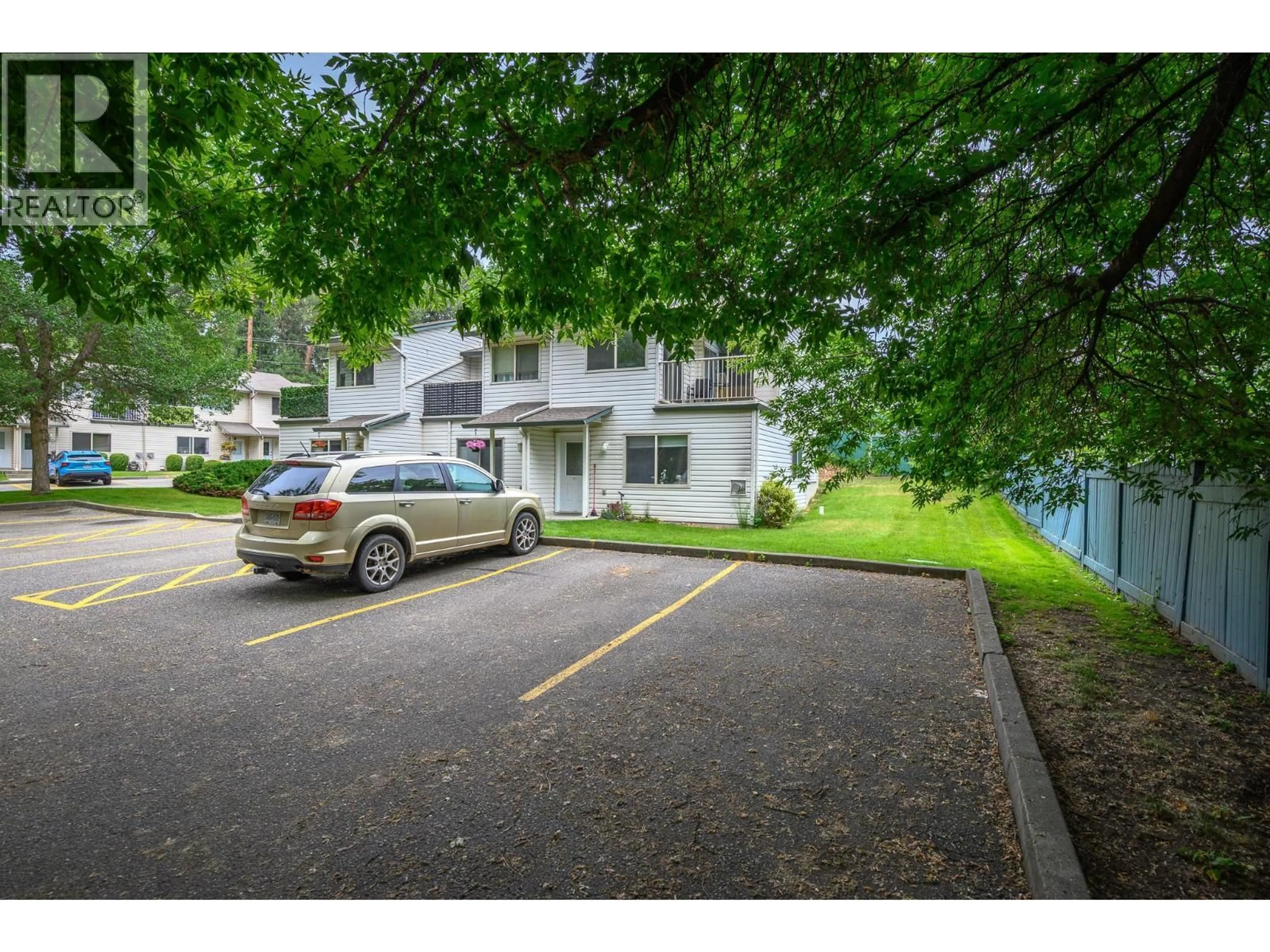A pic from outside/outdoor area/front of a property/back of a property/a pic from drone, street for 401 - 1607 43 AVENUE, Vernon British Columbia V1T9R9