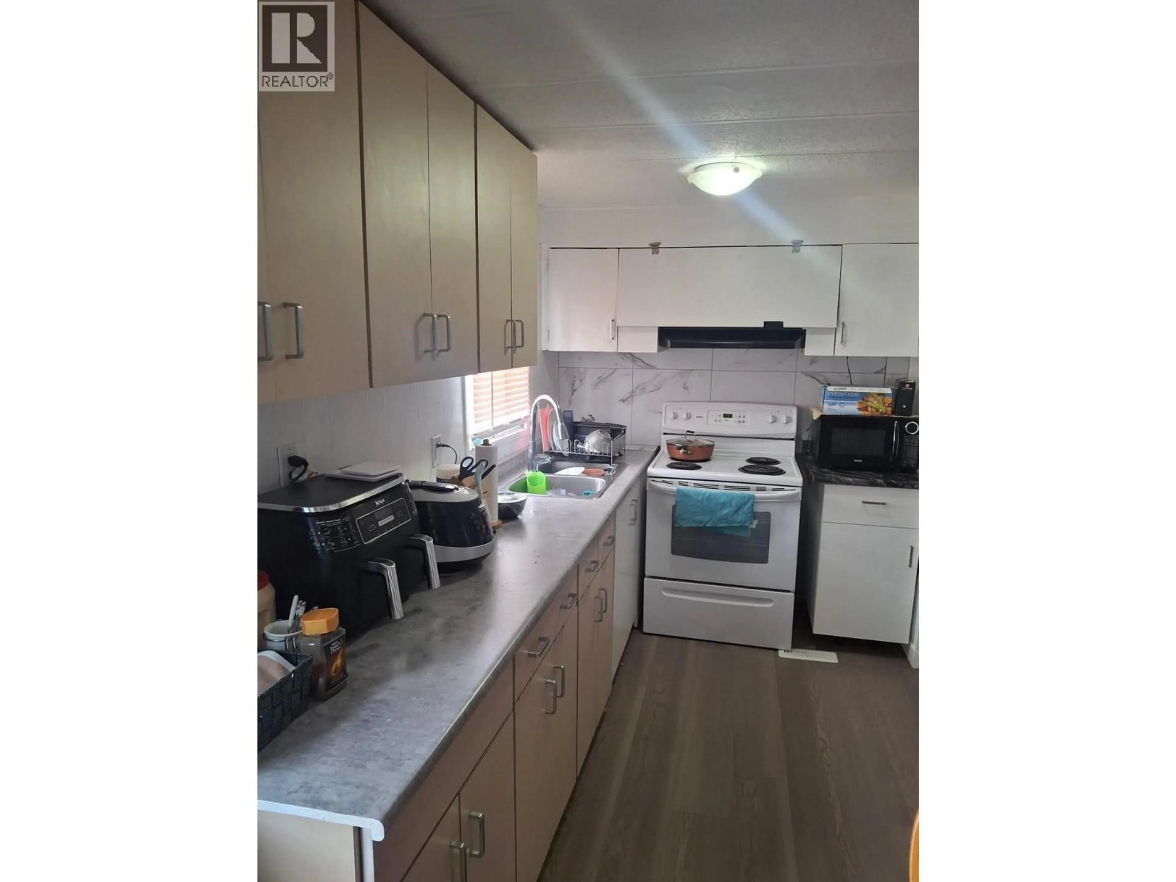 Standard kitchen, wood/laminate floor for 29 - 9700 18 STREET, Dawson Creek British Columbia V1G5A4