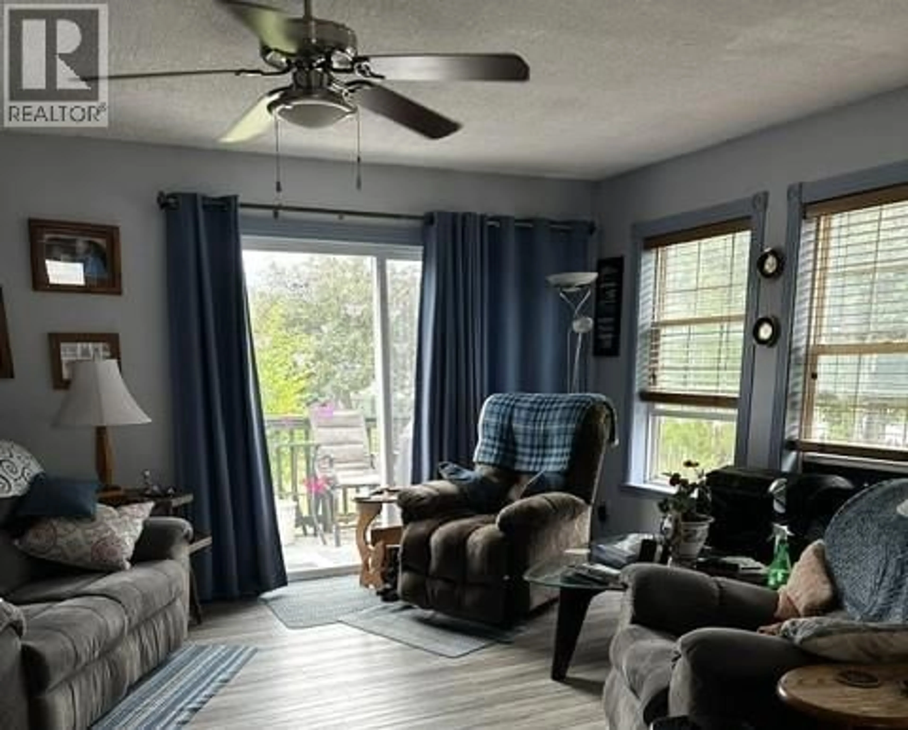 Living room with furniture, unknown for 2575 CLAPPERTON AVENUE, Merritt British Columbia V1K1J3