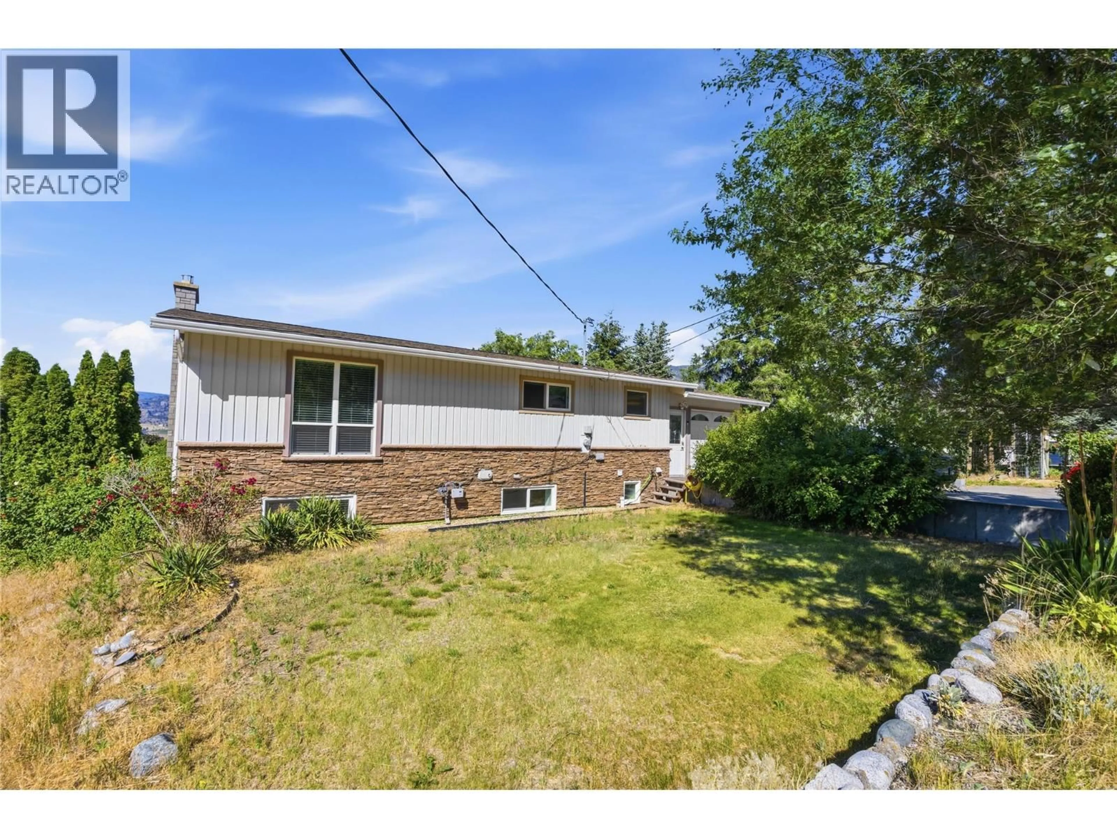 A pic from outside/outdoor area/front of a property/back of a property/a pic from drone, street for 199 LAKEHILL ROAD, Kaleden British Columbia V0H1K0