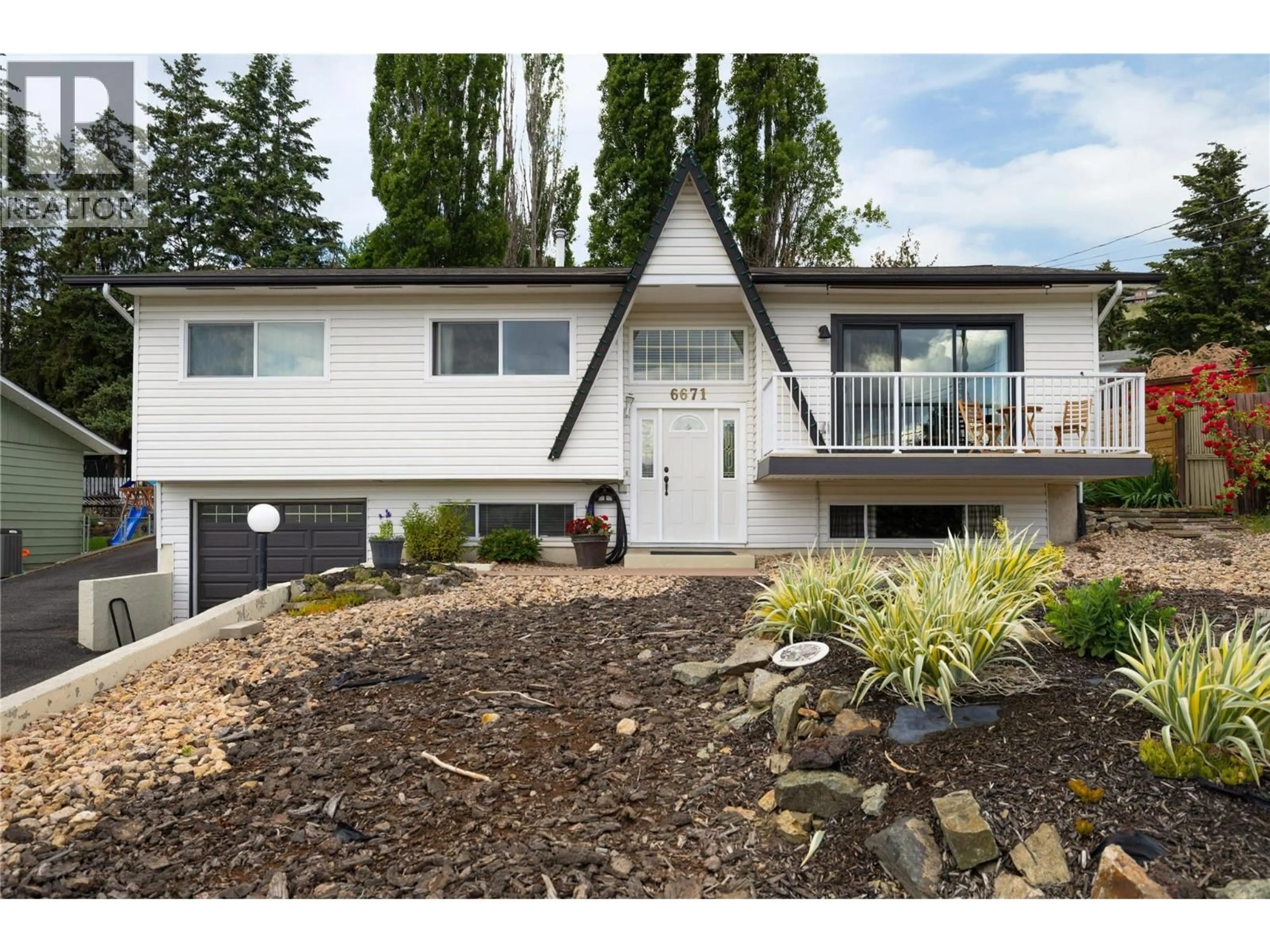 Home with vinyl exterior material, mountain view for 6671 ORCHARD HILL DRIVE, Vernon British Columbia V1H1B8