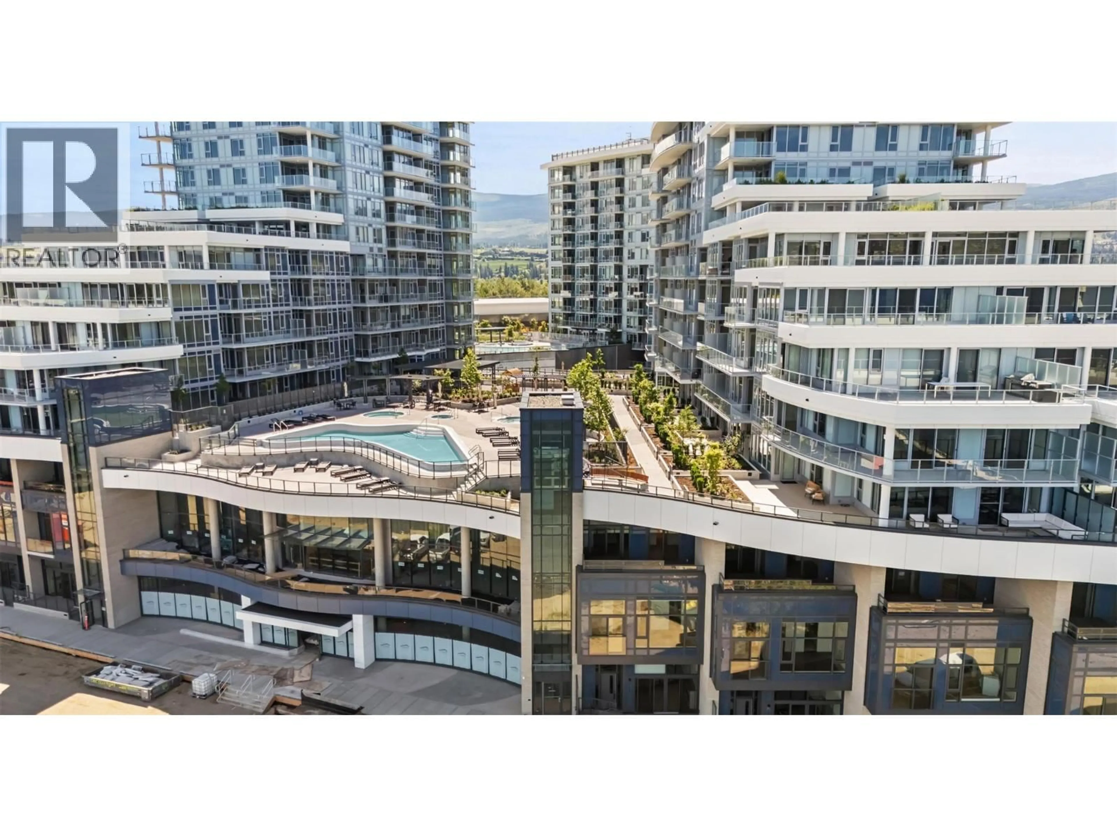 A pic from outside/outdoor area/front of a property/back of a property/a pic from drone, city buildings view from balcony for 715 - 3700 CAPOZZI ROAD, Kelowna British Columbia V1W0J5