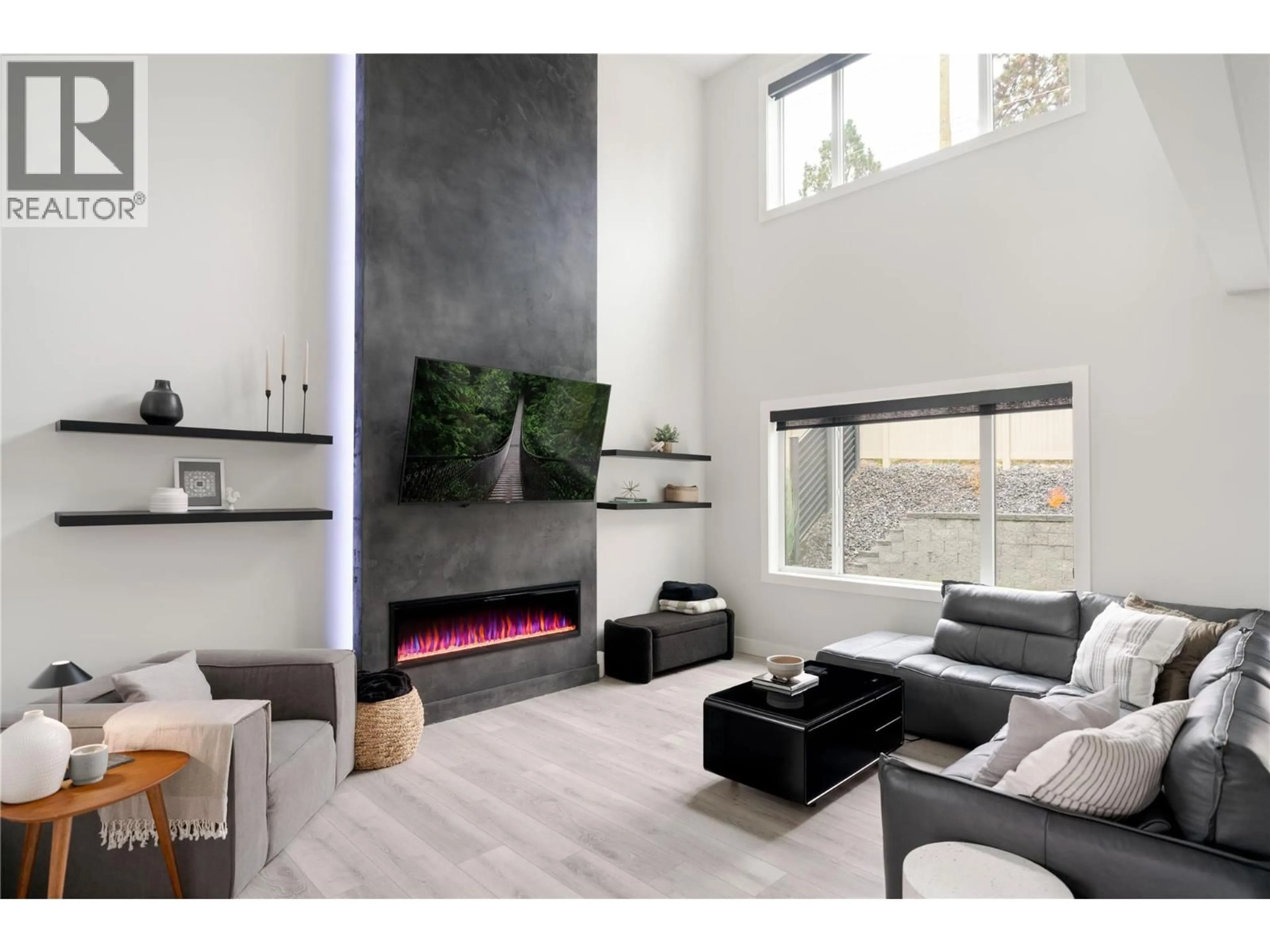 Living room with furniture, unknown for 4315 LADD COURT, Kelowna British Columbia V1W0B6