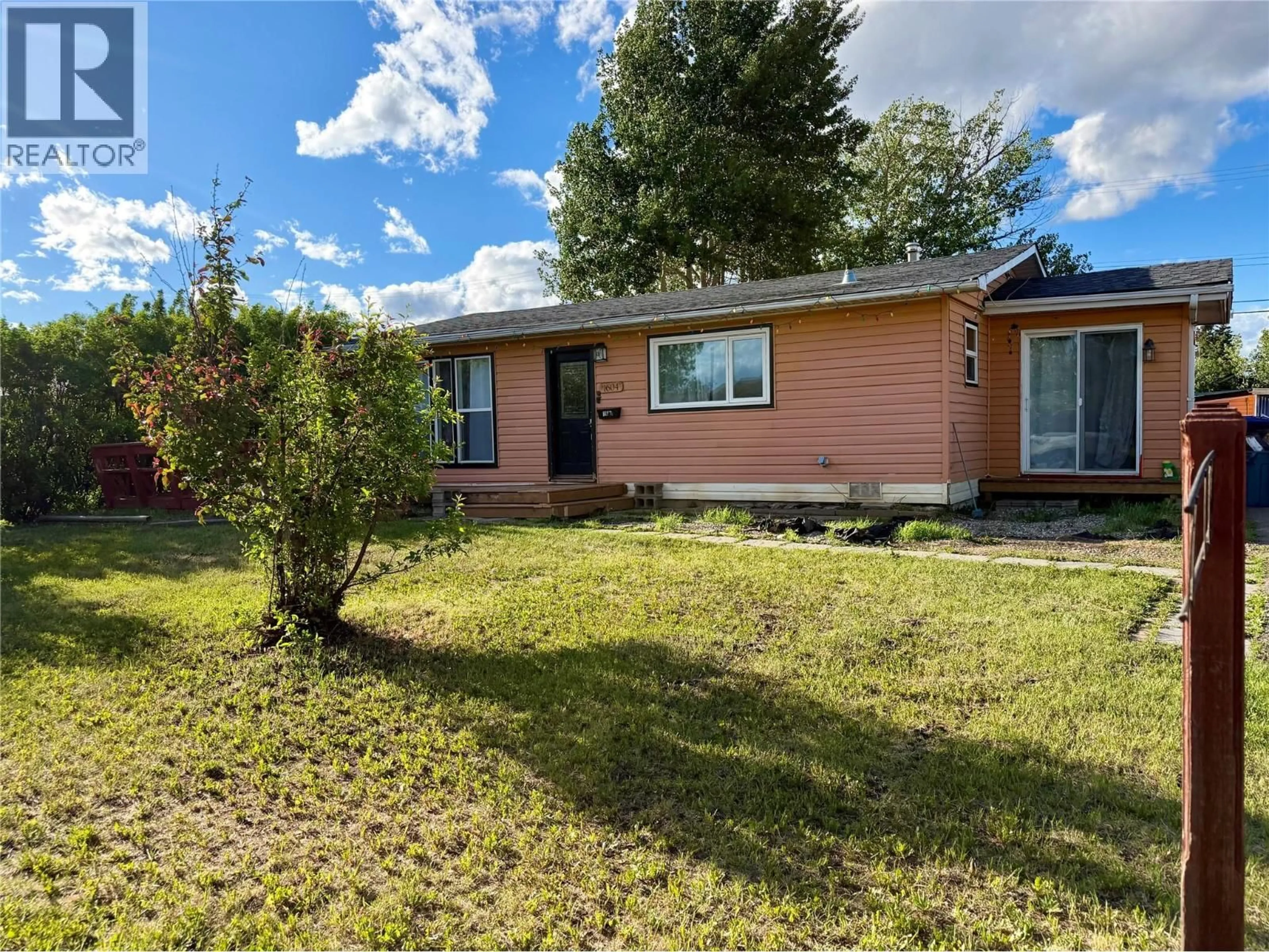 A pic from outside/outdoor area/front of a property/back of a property/a pic from drone, street for 1604 116 AVENUE, Dawson Creek British Columbia V1G3G4