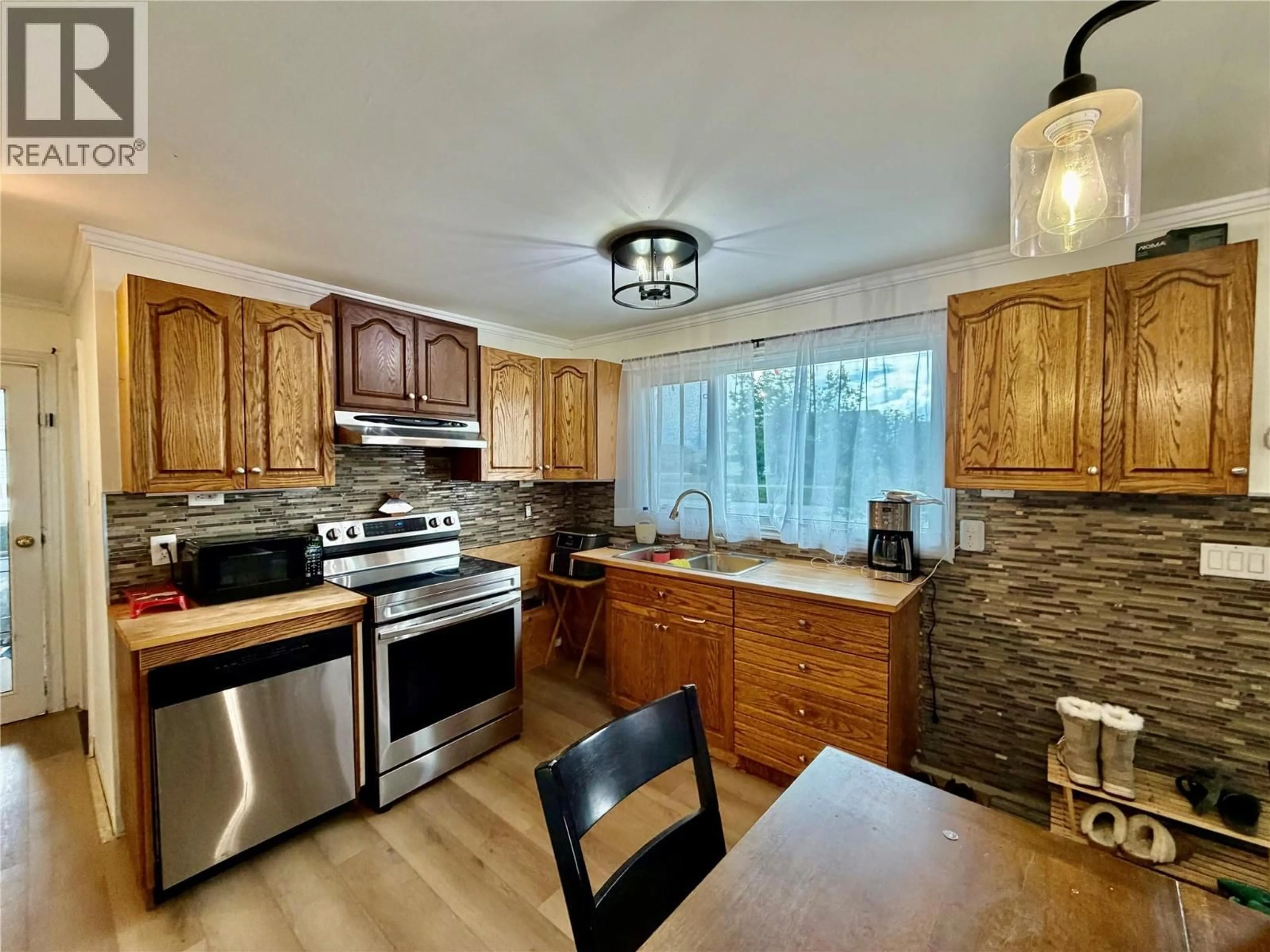Open concept kitchen, unknown for 1604 116 AVENUE, Dawson Creek British Columbia V1G3G4