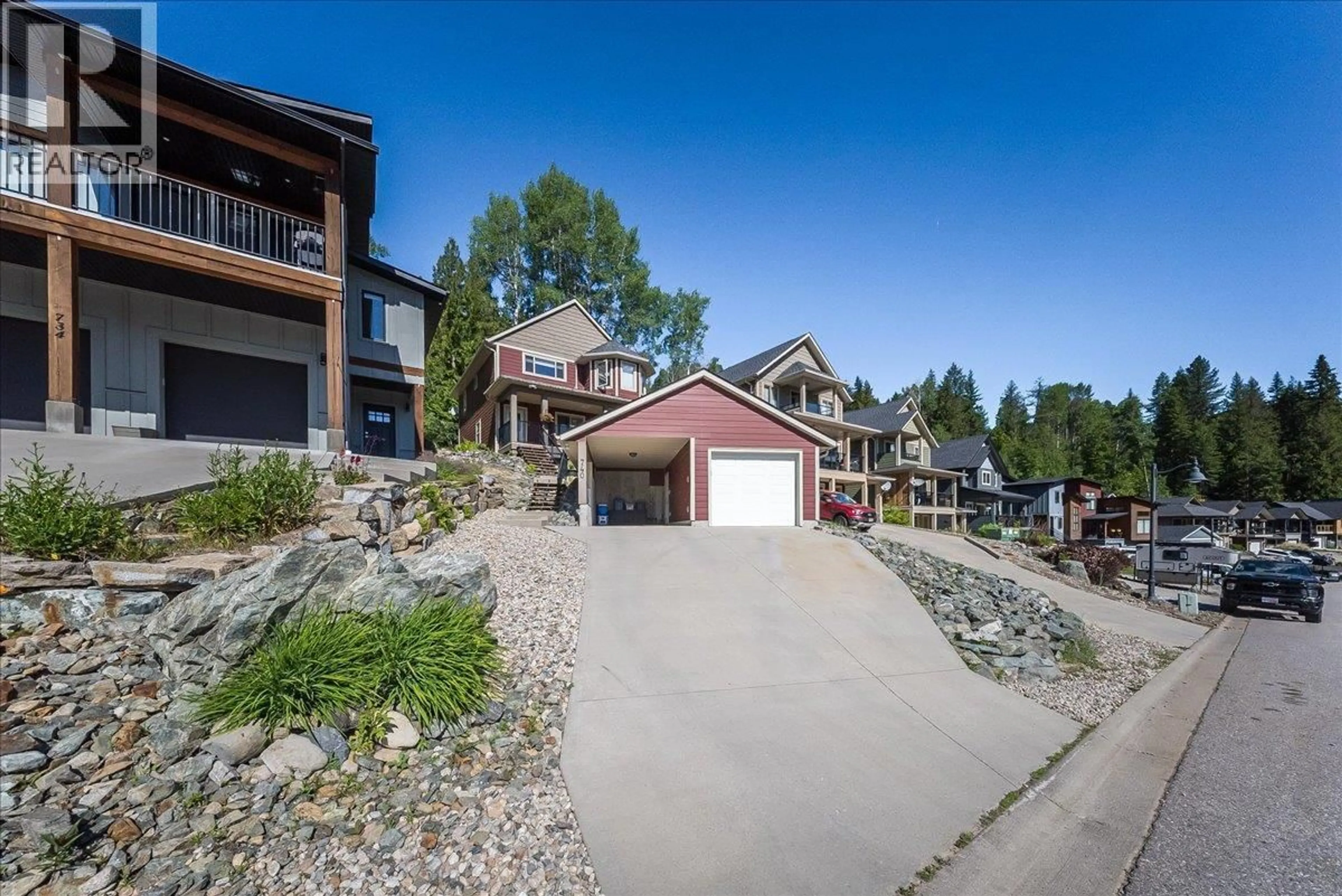A pic from outside/outdoor area/front of a property/back of a property/a pic from drone, street for 740 REDSTONE DRIVE, Rossland British Columbia V0G1Y0
