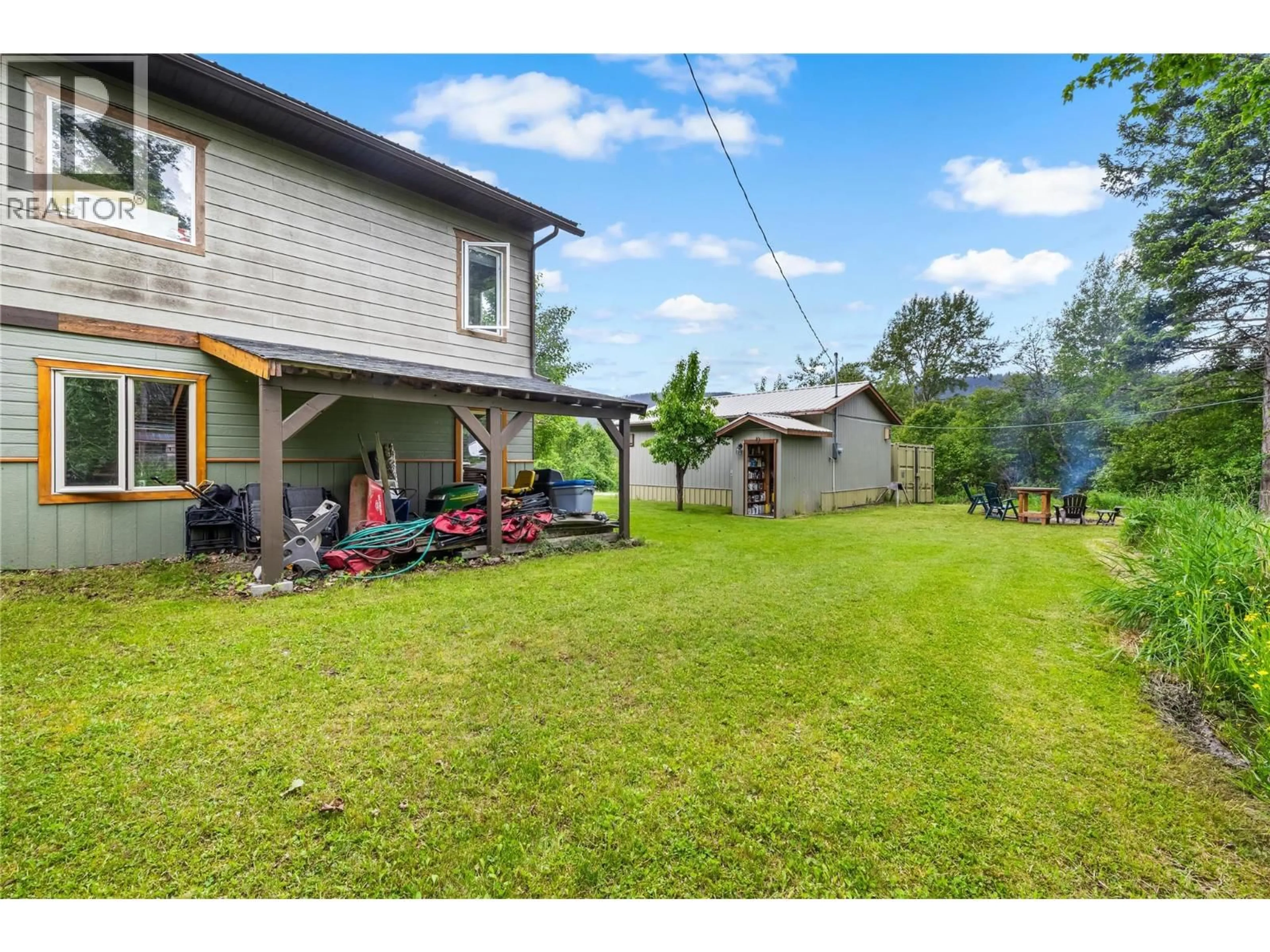 A pic from outside/outdoor area/front of a property/back of a property/a pic from drone, water/lake/river/ocean view for 15865 3A HIGHWAY, Crawford Bay British Columbia V0B1E0