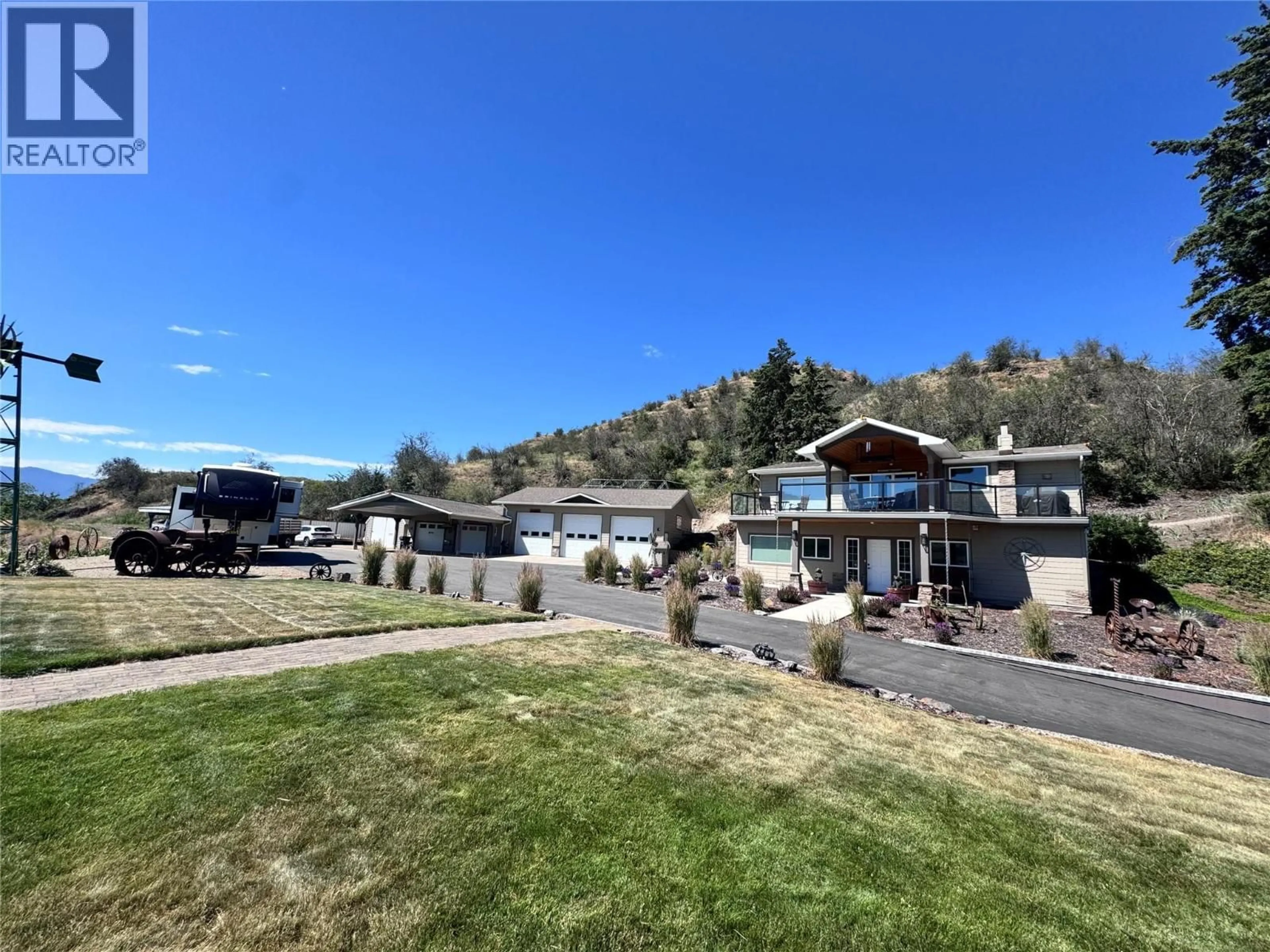 A pic from outside/outdoor area/front of a property/back of a property/a pic from drone, mountain view for 6902 OLD KAMLOOPS ROAD, Vernon British Columbia V1H1W1