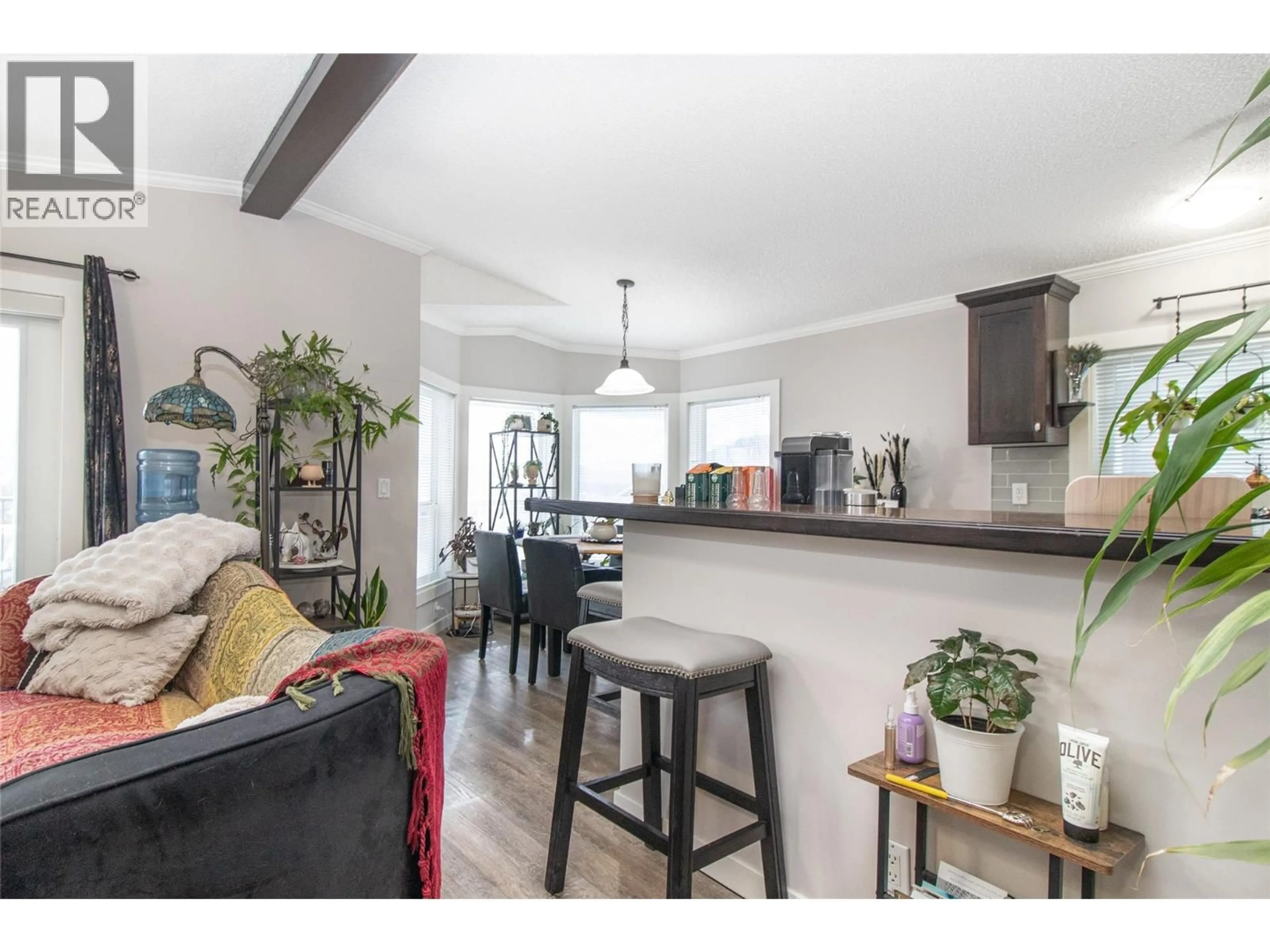 Open concept kitchen, wood/laminate floor for 1329 - 2440 OLD OKANAGAN HIGHWAY, West Kelowna British Columbia V4T3A2