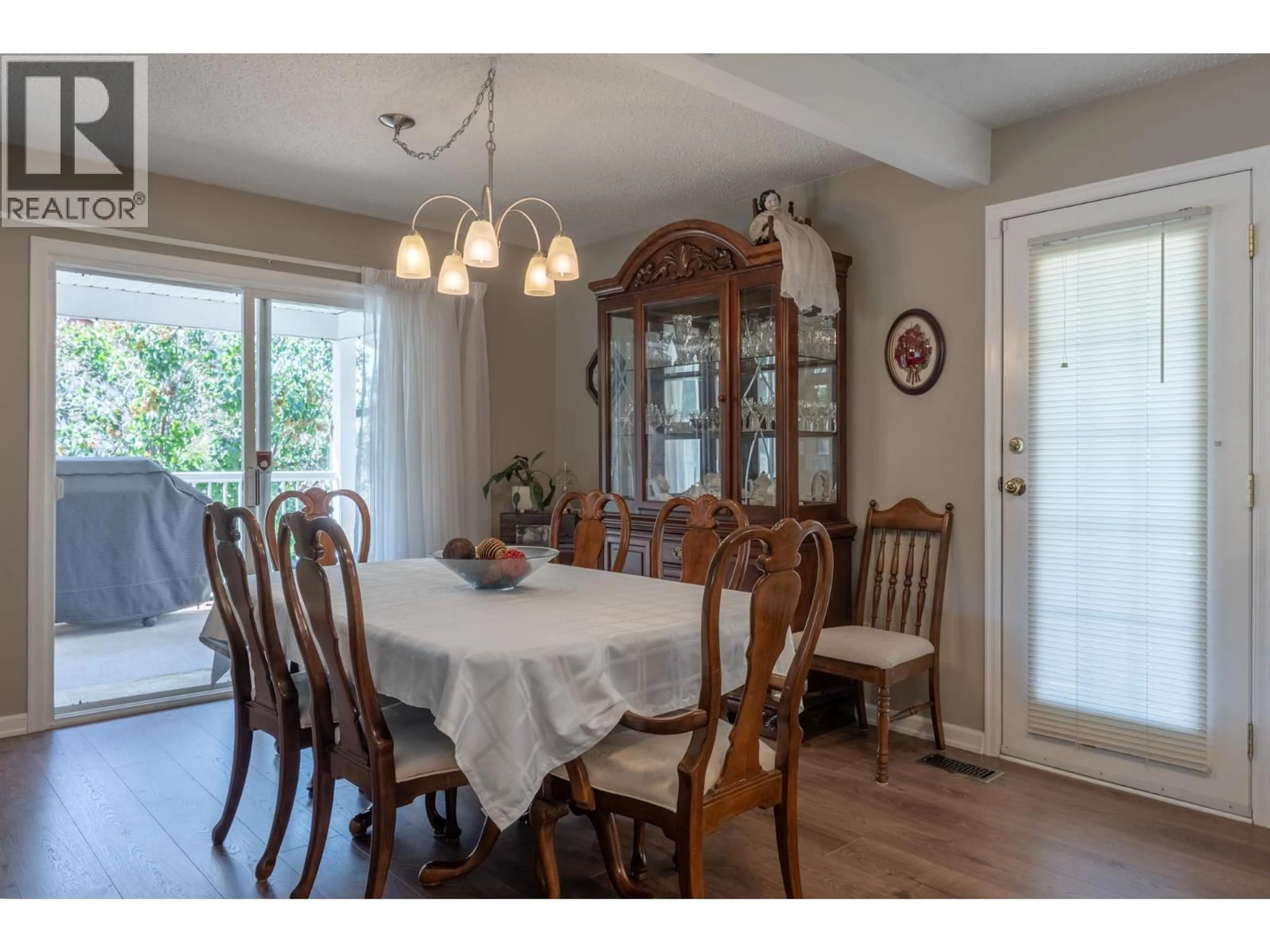 Dining room, wood/laminate floor for 780 PRINCESS COURT, Kelowna British Columbia V1X5X5