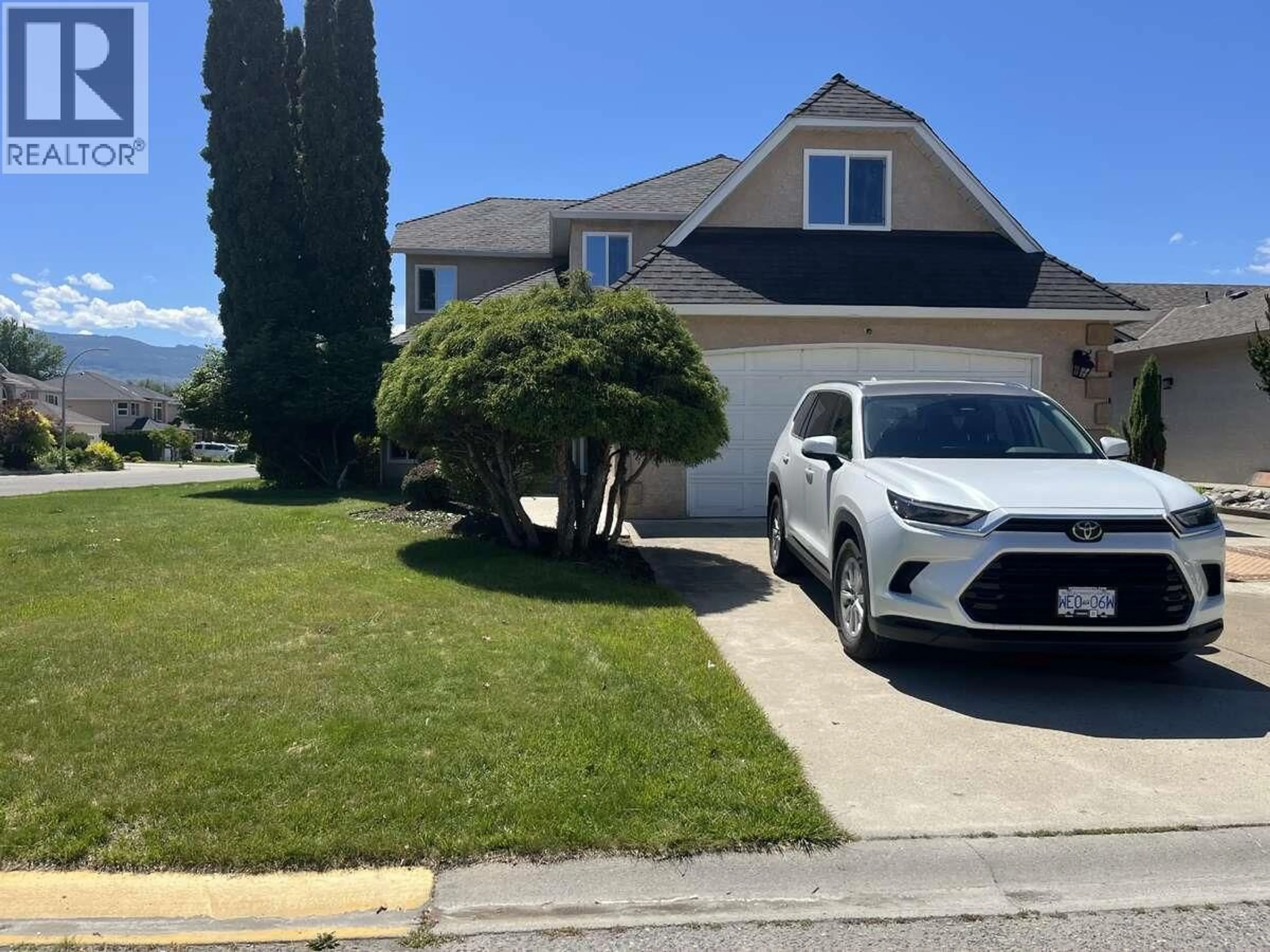 A pic from outside/outdoor area/front of a property/back of a property/a pic from drone, street for 877 SPRINGSIDE COURT, Kelowna British Columbia V1W3L8