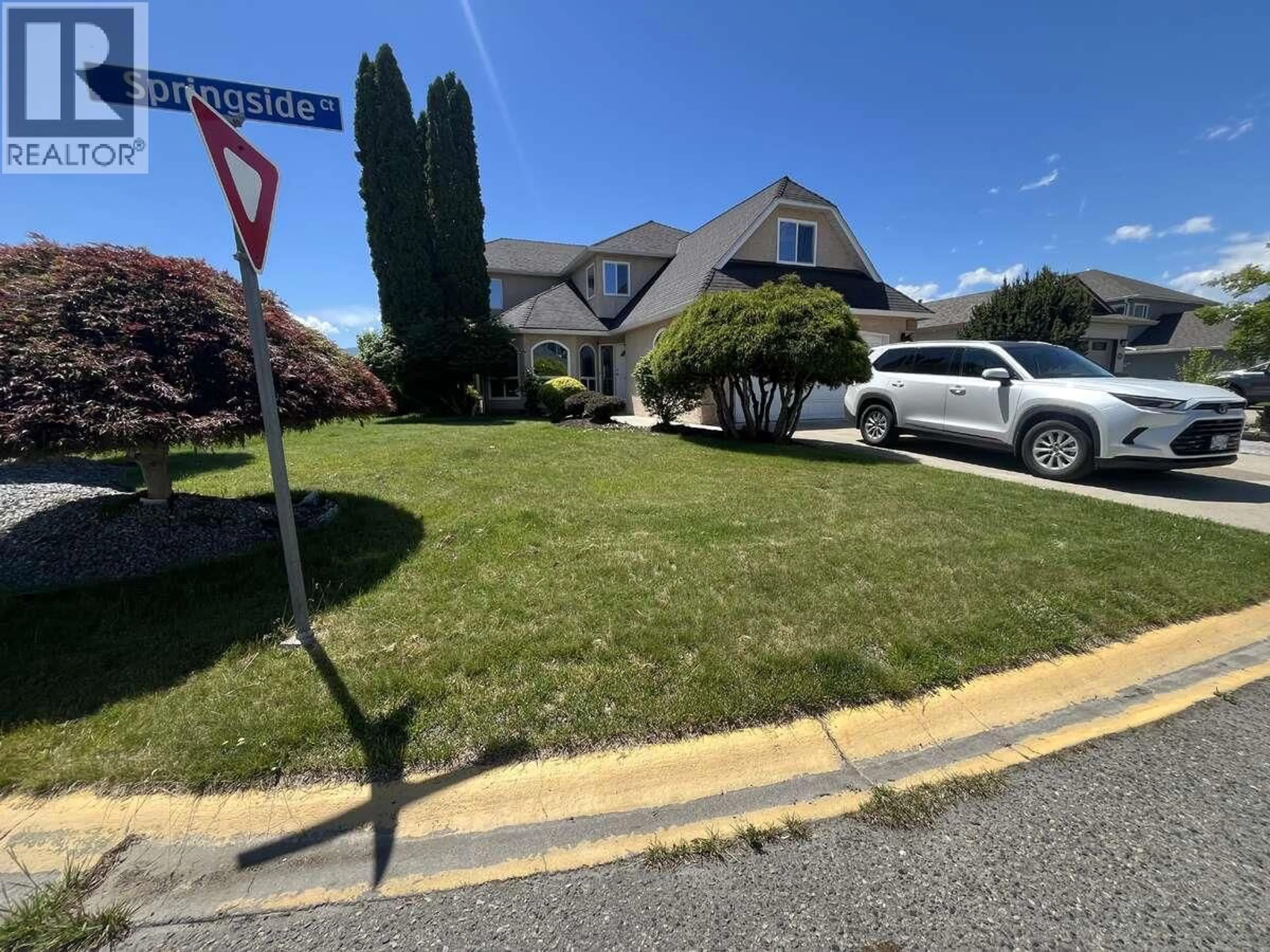 A pic from outside/outdoor area/front of a property/back of a property/a pic from drone, street for 877 SPRINGSIDE COURT, Kelowna British Columbia V1W3L8