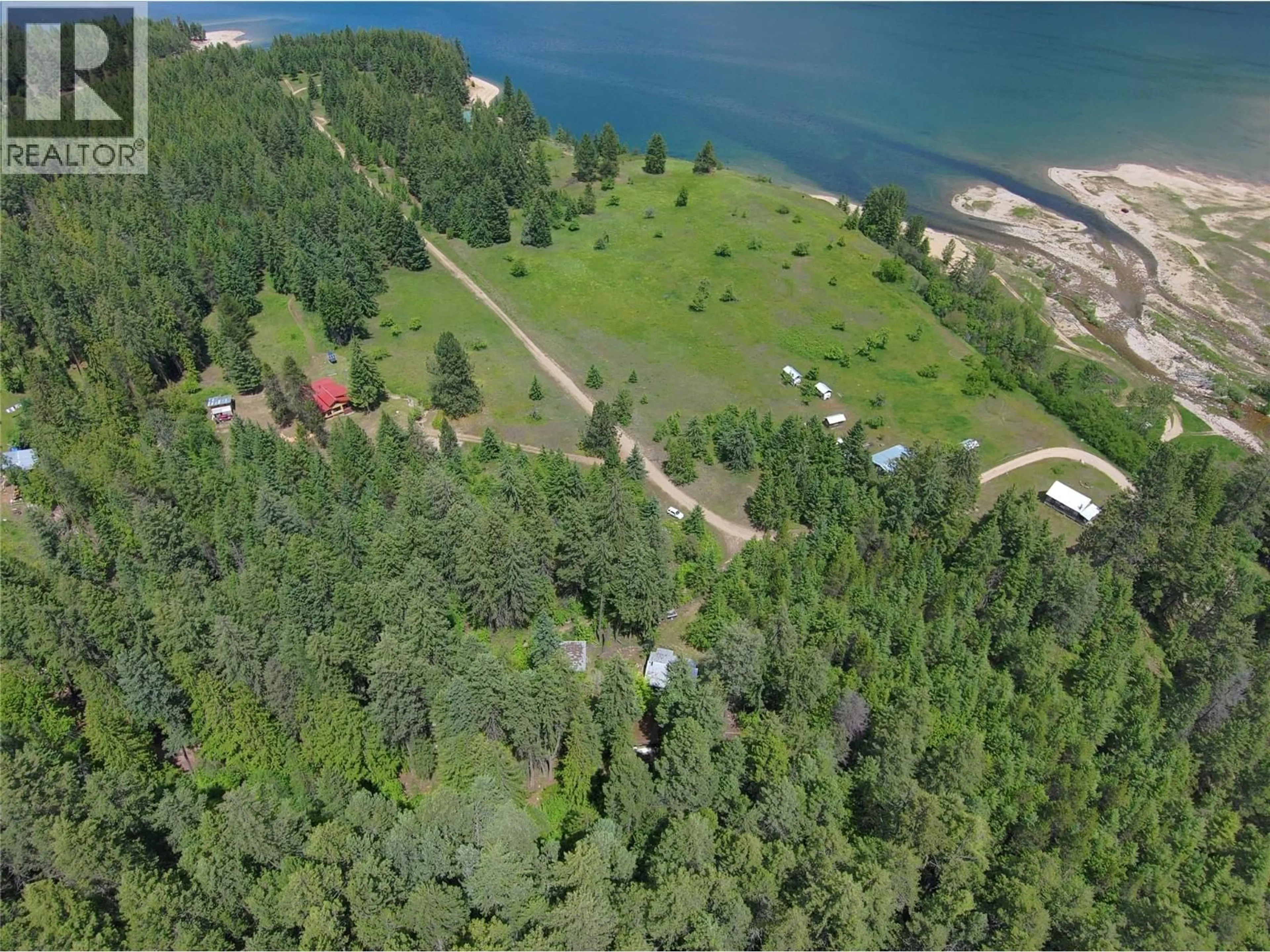A pic from outside/outdoor area/front of a property/back of a property/a pic from drone, water/lake/river/ocean view for 648 LOWER ARROW LAKE ROAD, Renata British Columbia V1N4V8