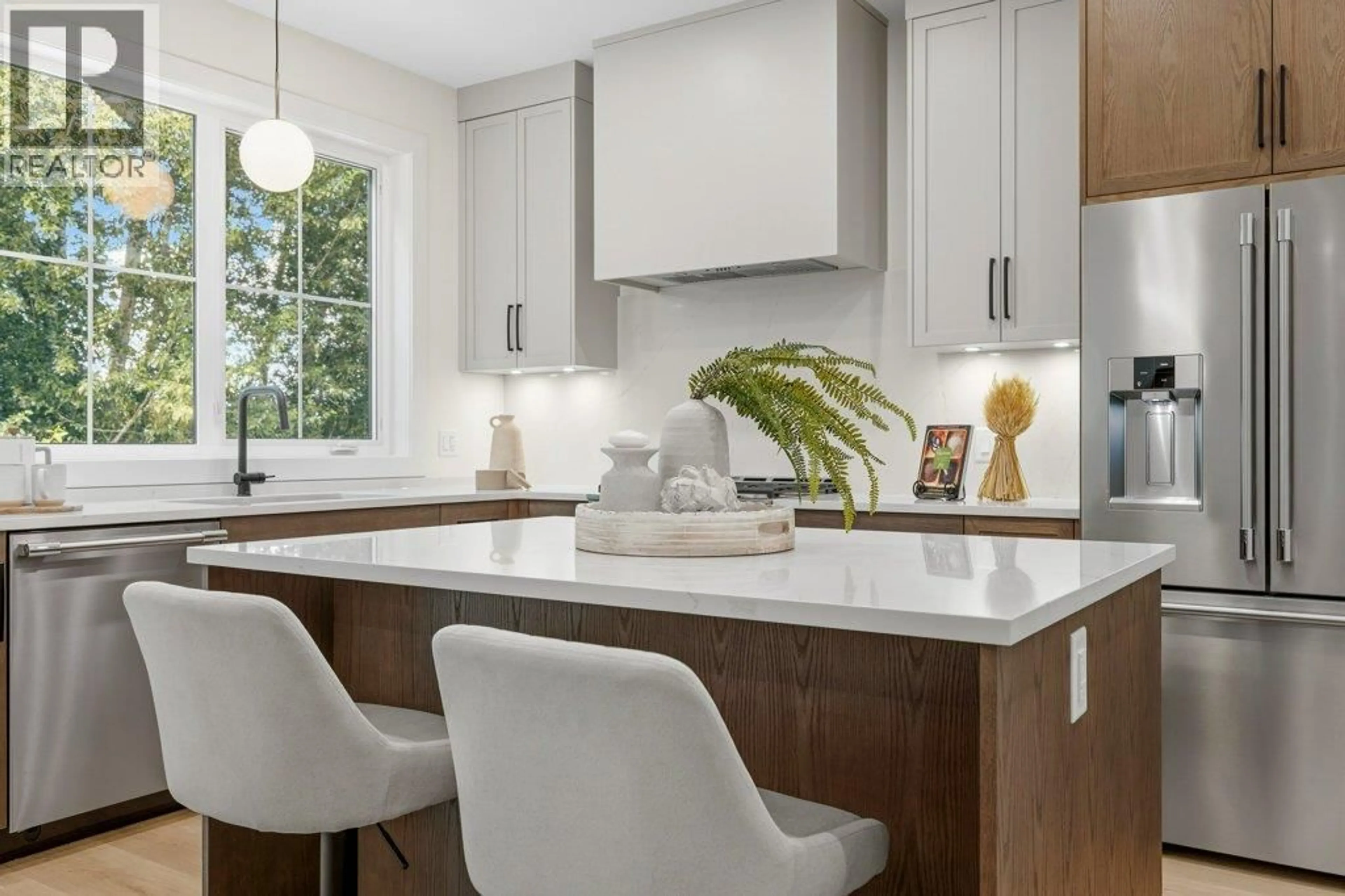 Contemporary kitchen, ceramic/tile floor for 906 BULL CRESCENT, Kelowna British Columbia V1W0E6