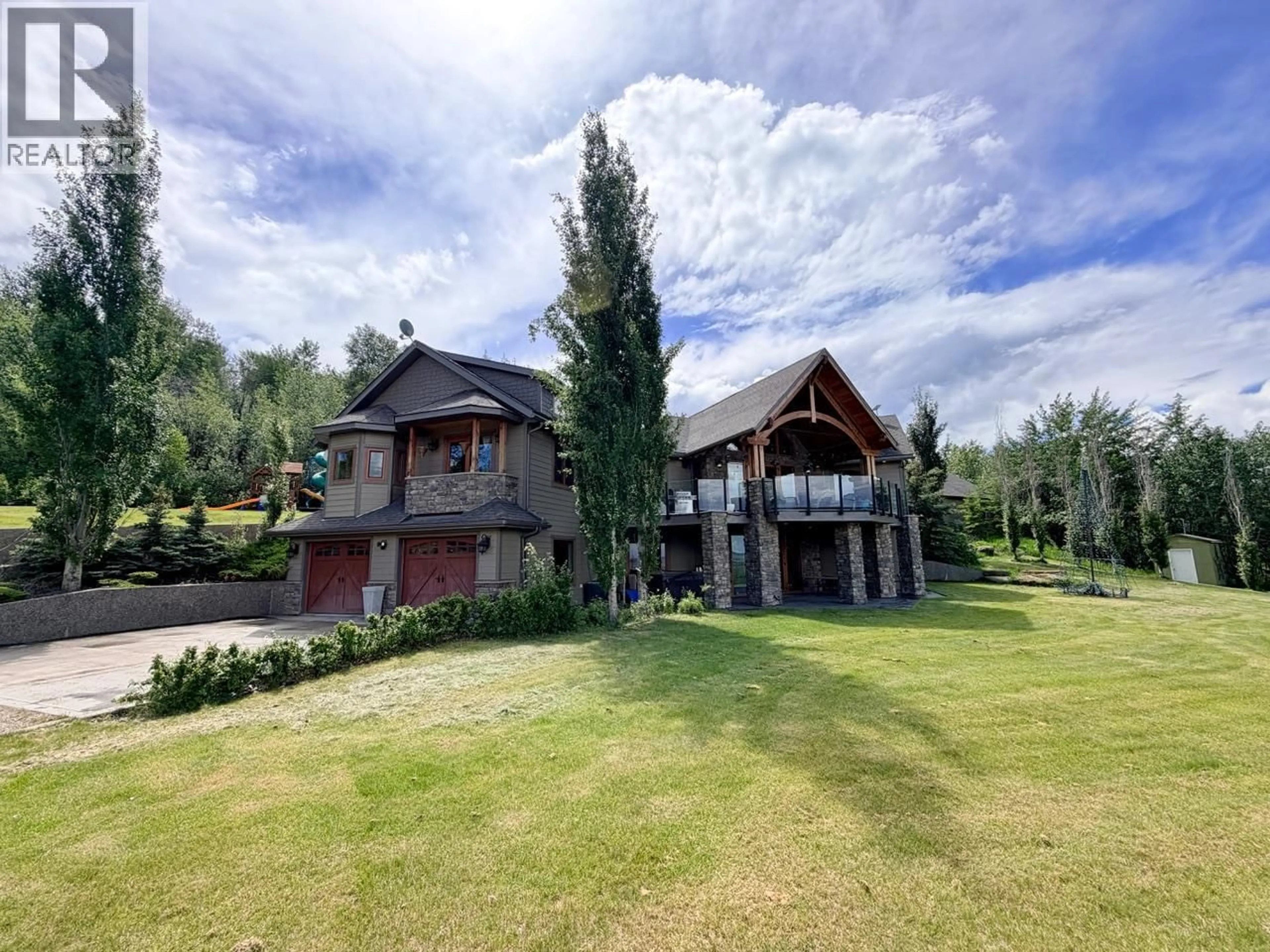 A pic from outside/outdoor area/front of a property/back of a property/a pic from drone, mountain view for 2793 CHRISTOPHER OTHER, Dawson Creek British Columbia V1G0B2