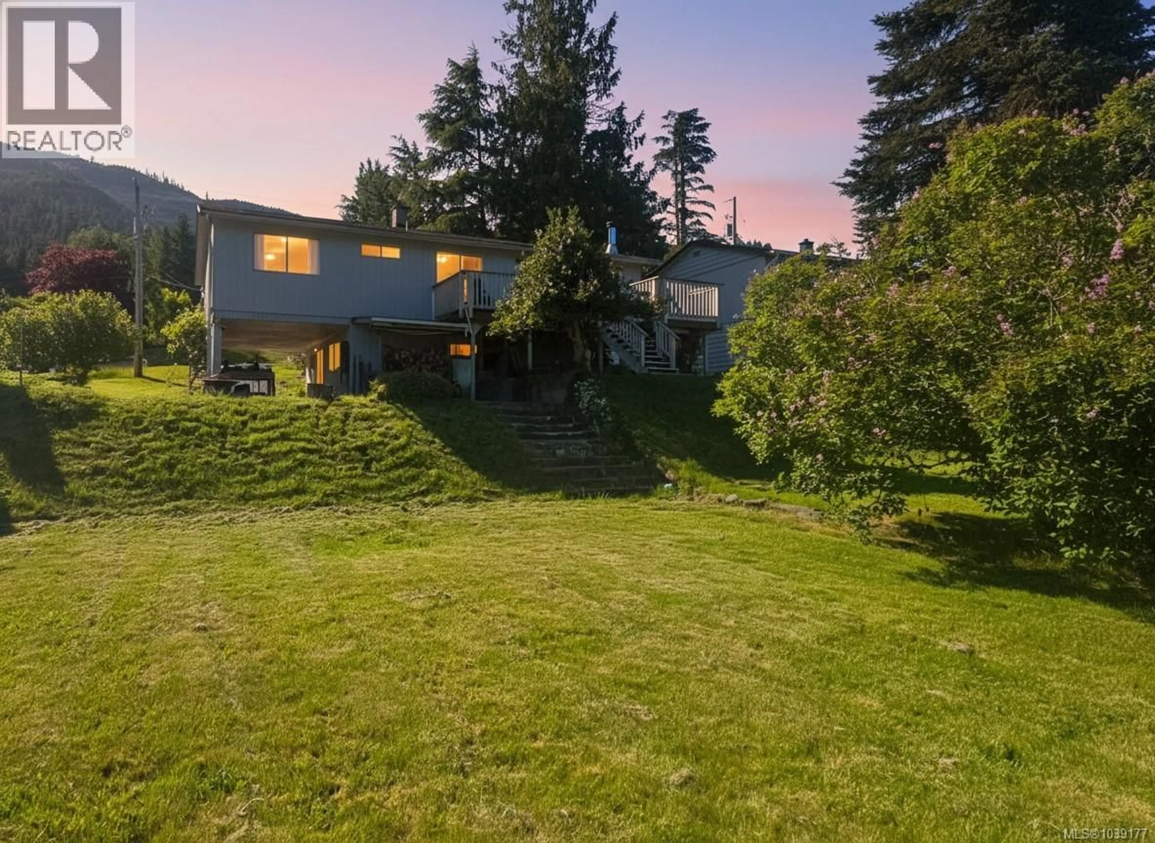 A pic from outside/outdoor area/front of a property/back of a property/a pic from drone, mountain view for 221 SPAR STREET, Sayward British Columbia V0P1R0