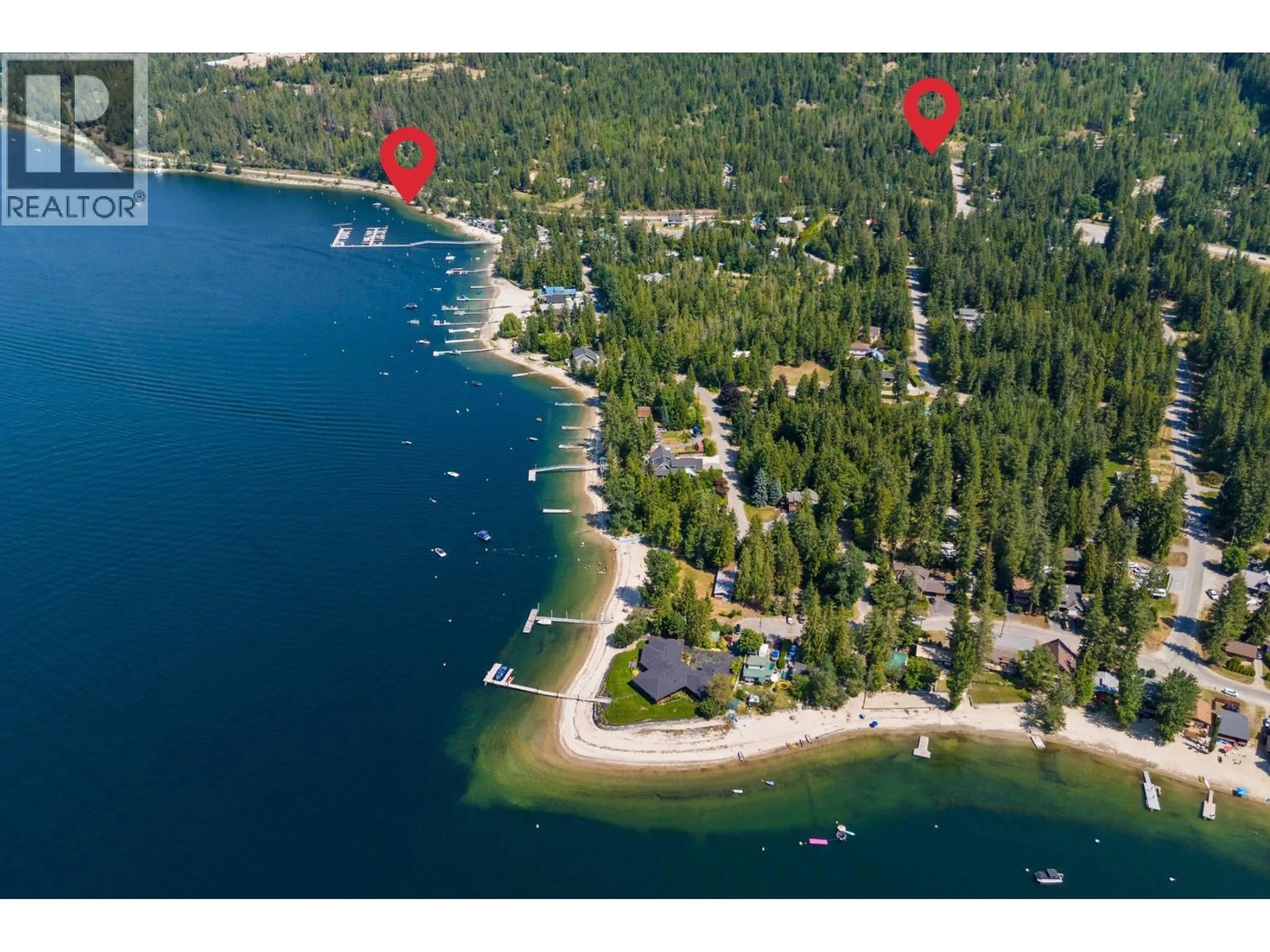 A pic from outside/outdoor area/front of a property/back of a property/a pic from drone, water/lake/river/ocean view for 587 HUNT ROAD, Swansea Point British Columbia V0E2K2