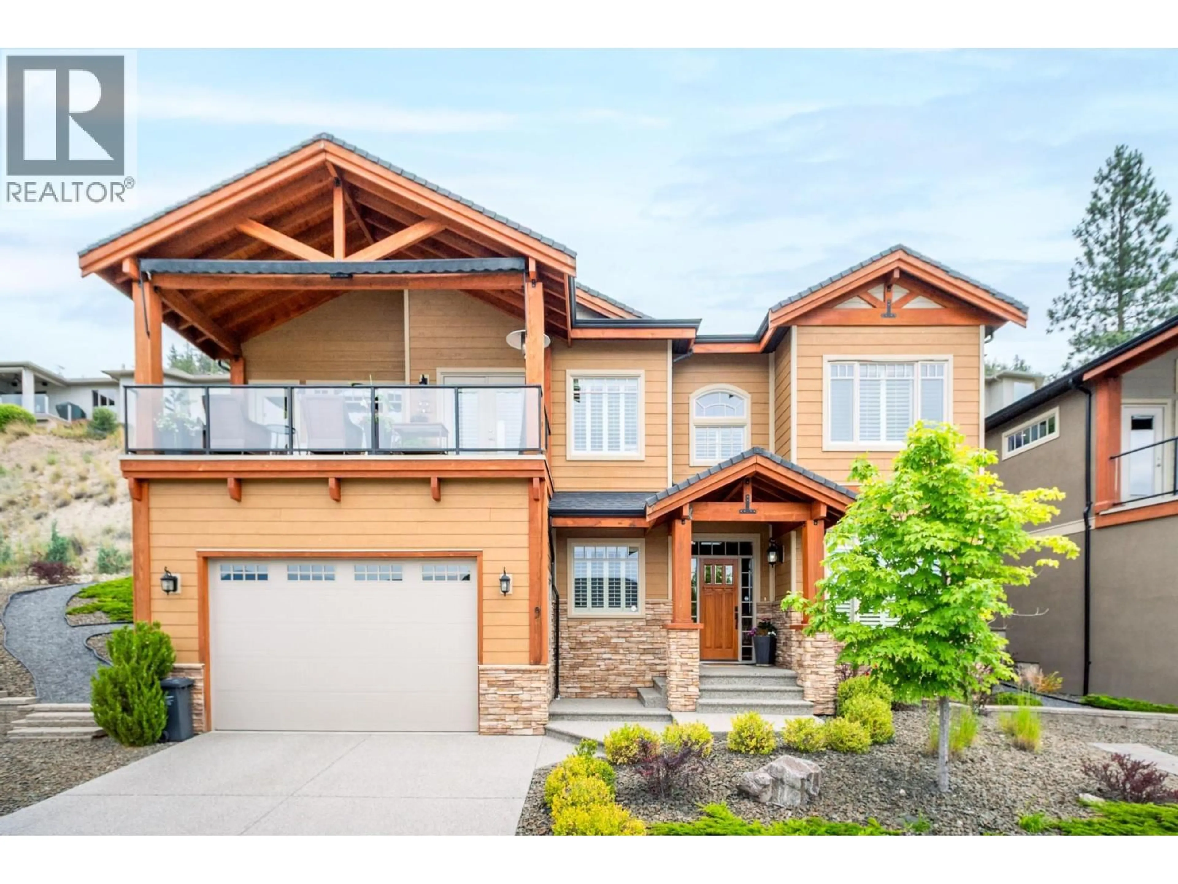 Home with brick exterior material, street for 9 - 673 DENALI COURT, Kelowna British Columbia V1V2R2