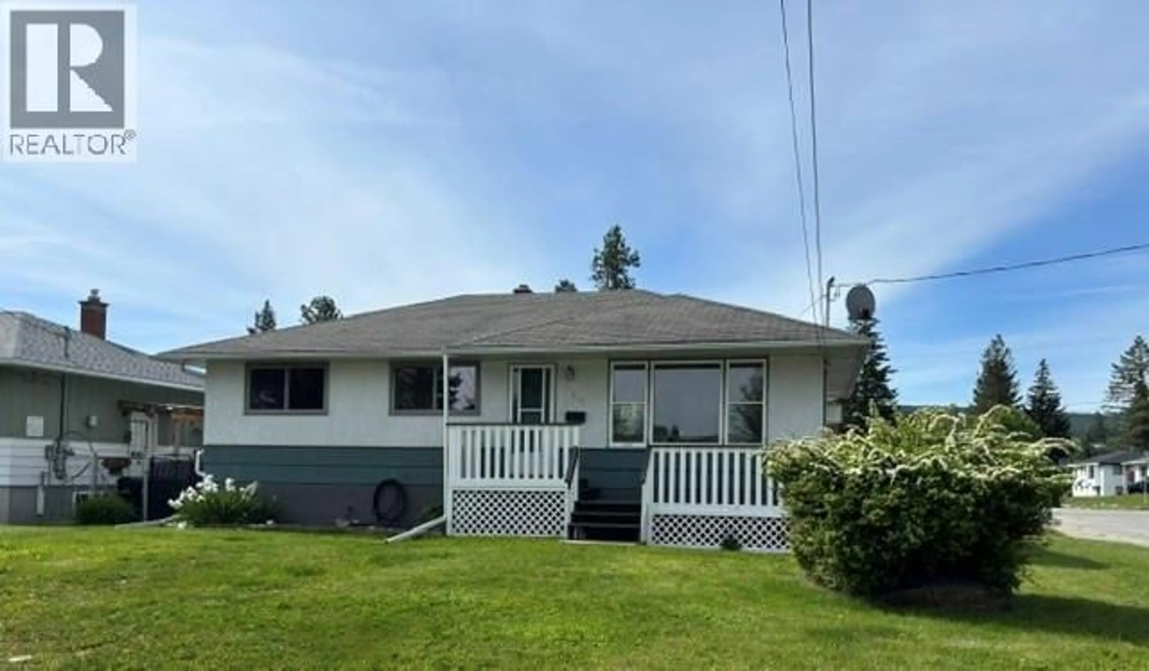 Home with vinyl exterior material, street for 1201 6TH STREET, Cranbrook British Columbia V1C1L8