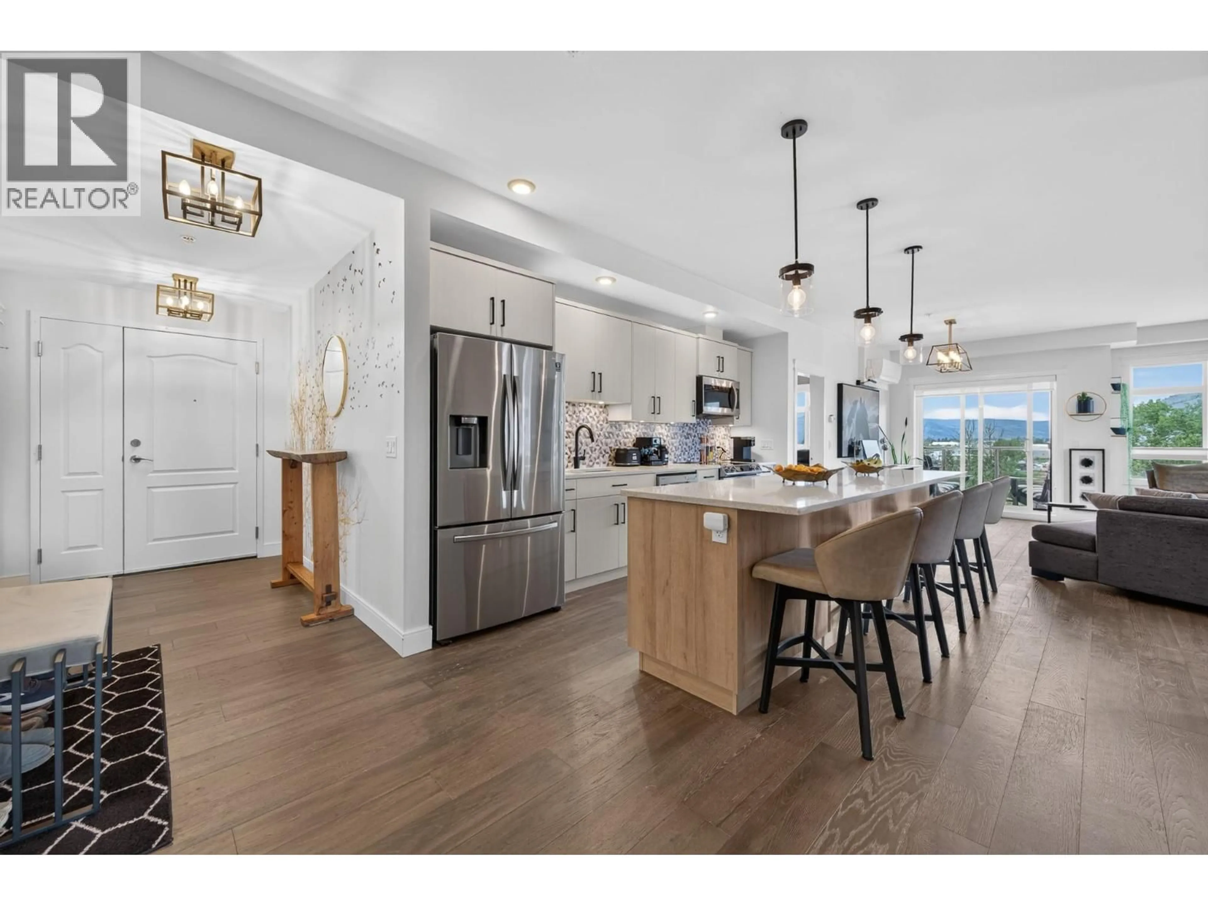 Open concept kitchen, wood/laminate floor for 303 - 568 LORNE STREET, Kamloops British Columbia V2C1W3