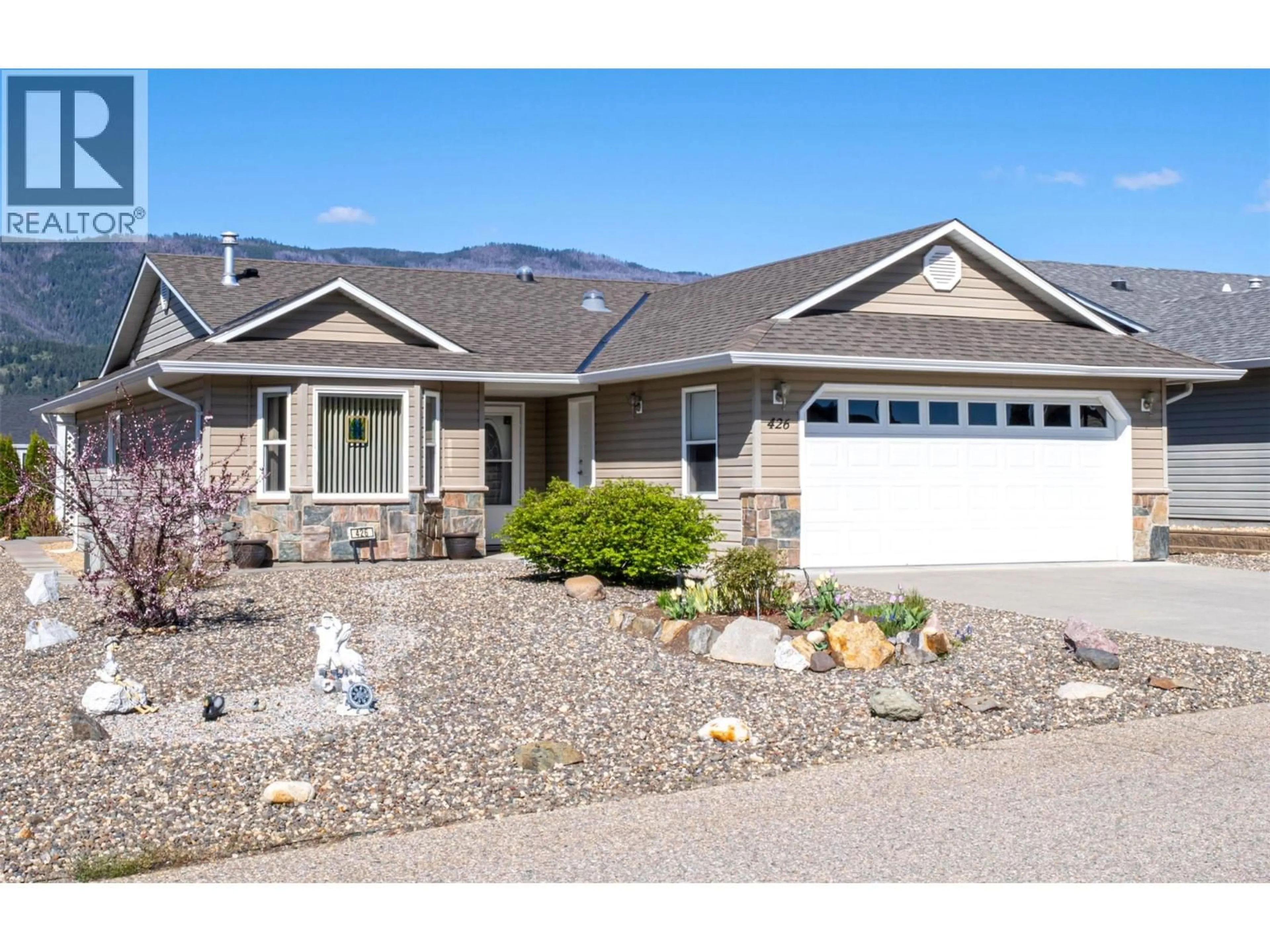Home with vinyl exterior material, street for 426 4TH STREET, Vernon British Columbia V1H1Z1