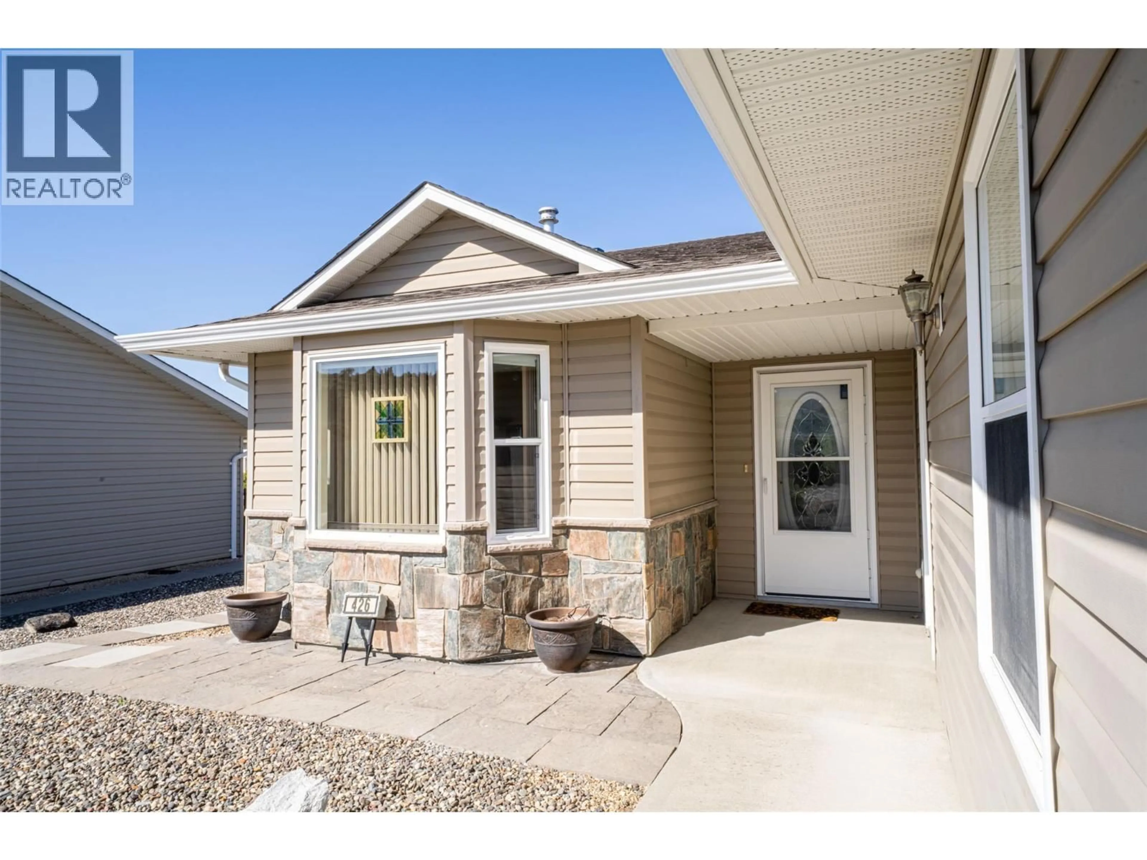 Home with vinyl exterior material, street for 426 4TH STREET, Vernon British Columbia V1H1Z1