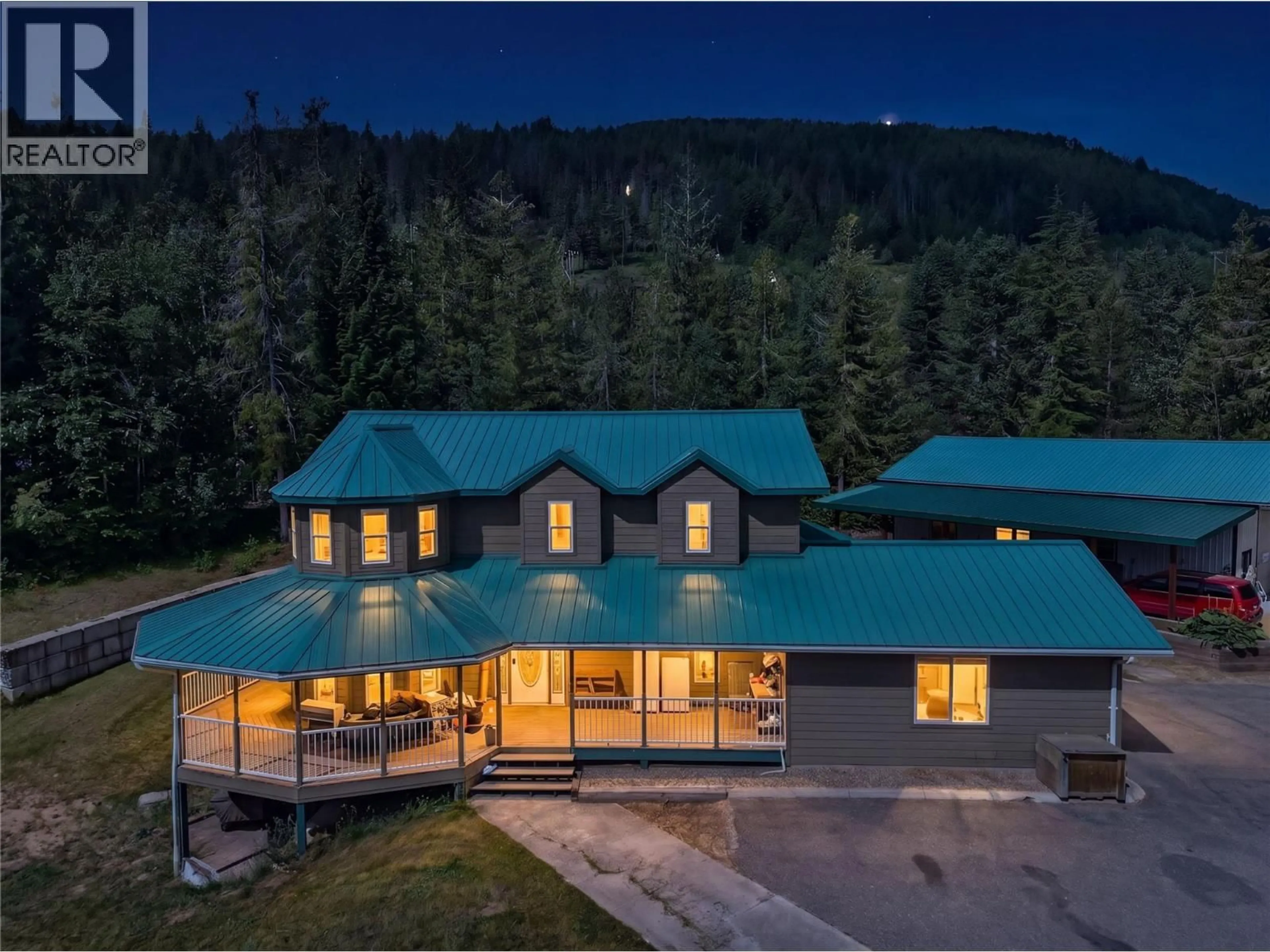 A pic from outside/outdoor area/front of a property/back of a property/a pic from drone, mountain view for 5364 SHAW ROAD, Salmon Arm British Columbia V1E2W2