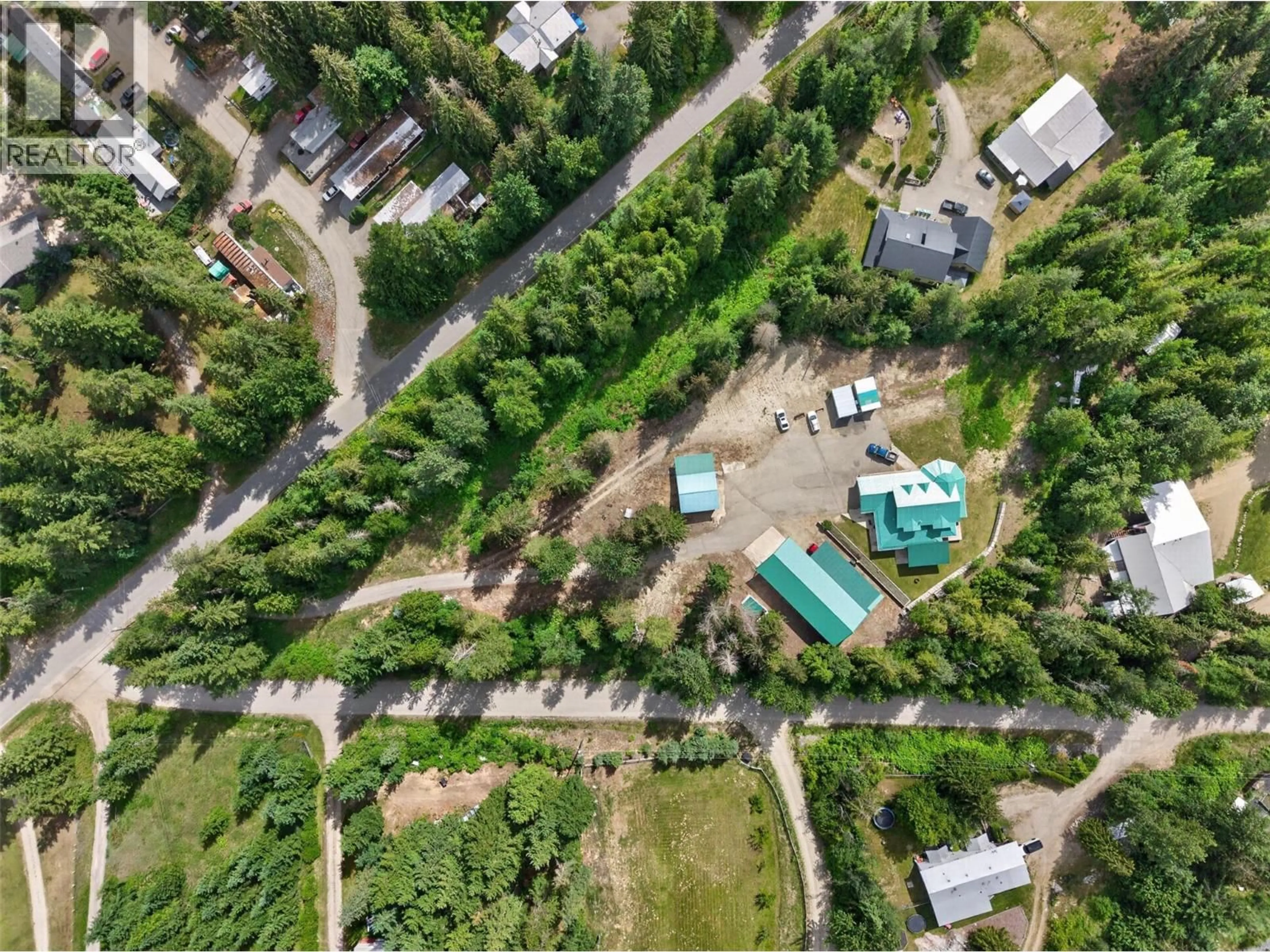 A pic from outside/outdoor area/front of a property/back of a property/a pic from drone, forest/trees view for 5364 SHAW ROAD, Salmon Arm British Columbia V1E2W2