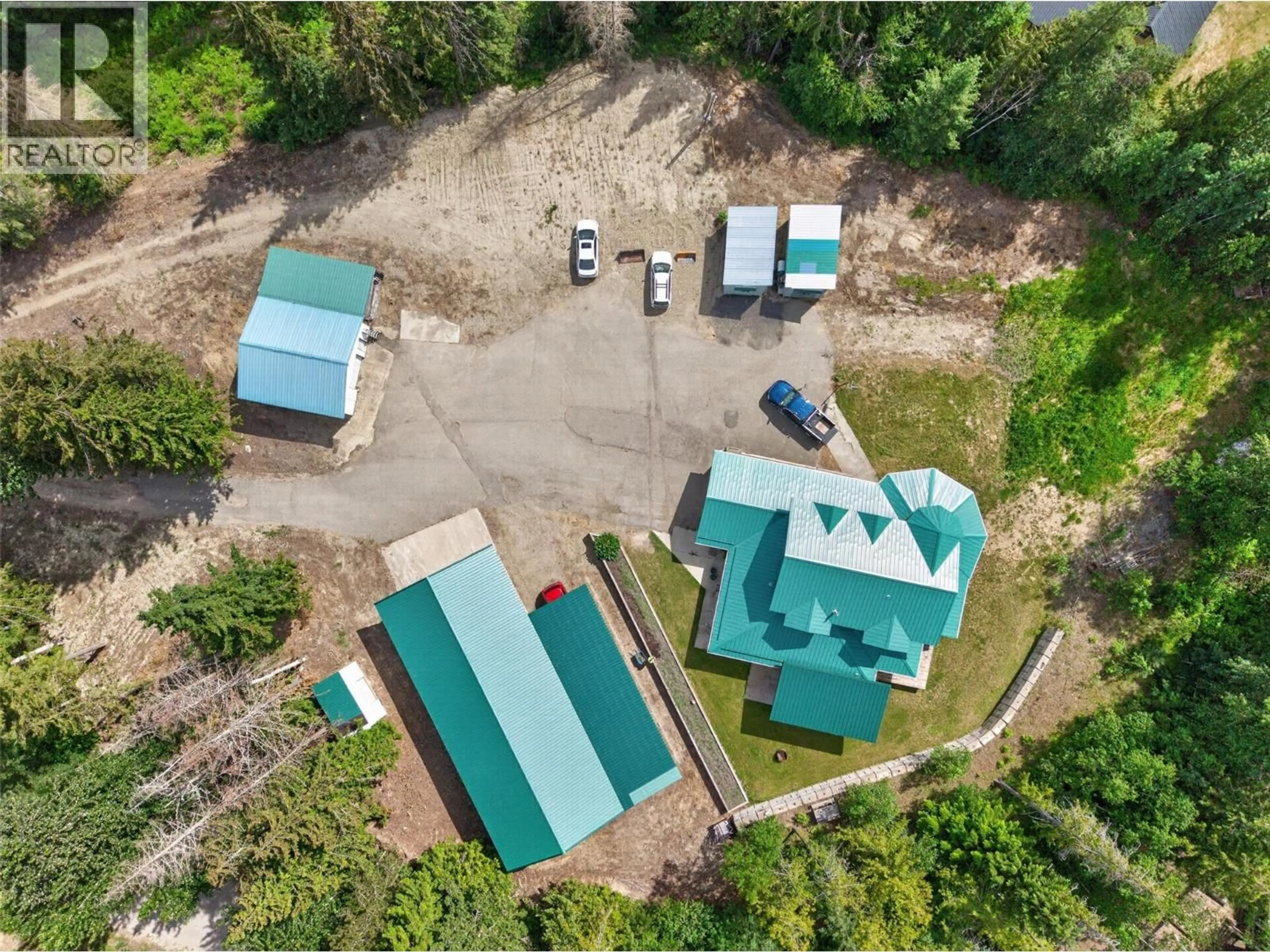 A pic from outside/outdoor area/front of a property/back of a property/a pic from drone, building for 5364 SHAW ROAD, Salmon Arm British Columbia V1E2W2