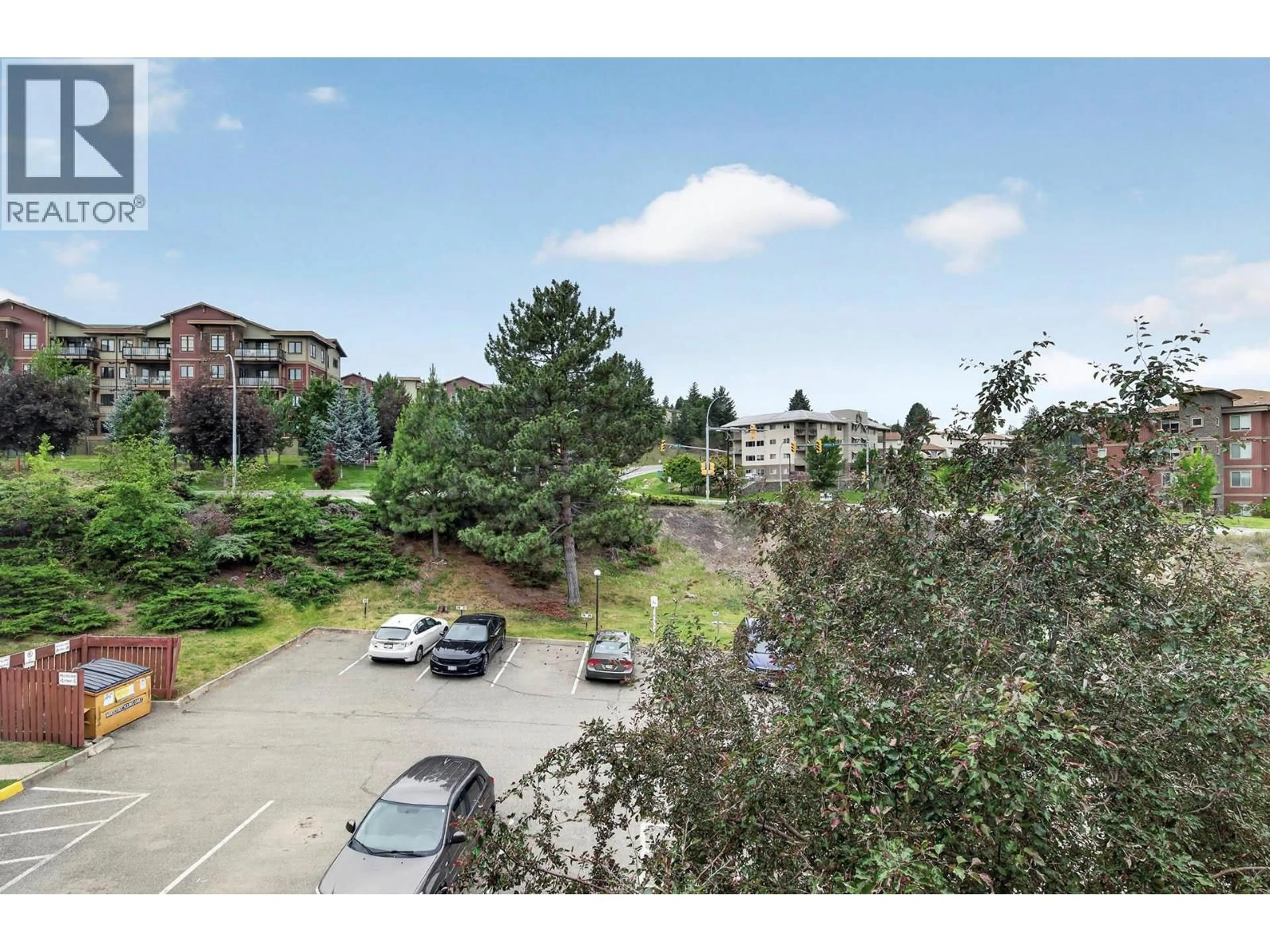 A pic from outside/outdoor area/front of a property/back of a property/a pic from drone, unknown for 11 - 1435 SUMMIT DRIVE, Kamloops British Columbia V2E1S4