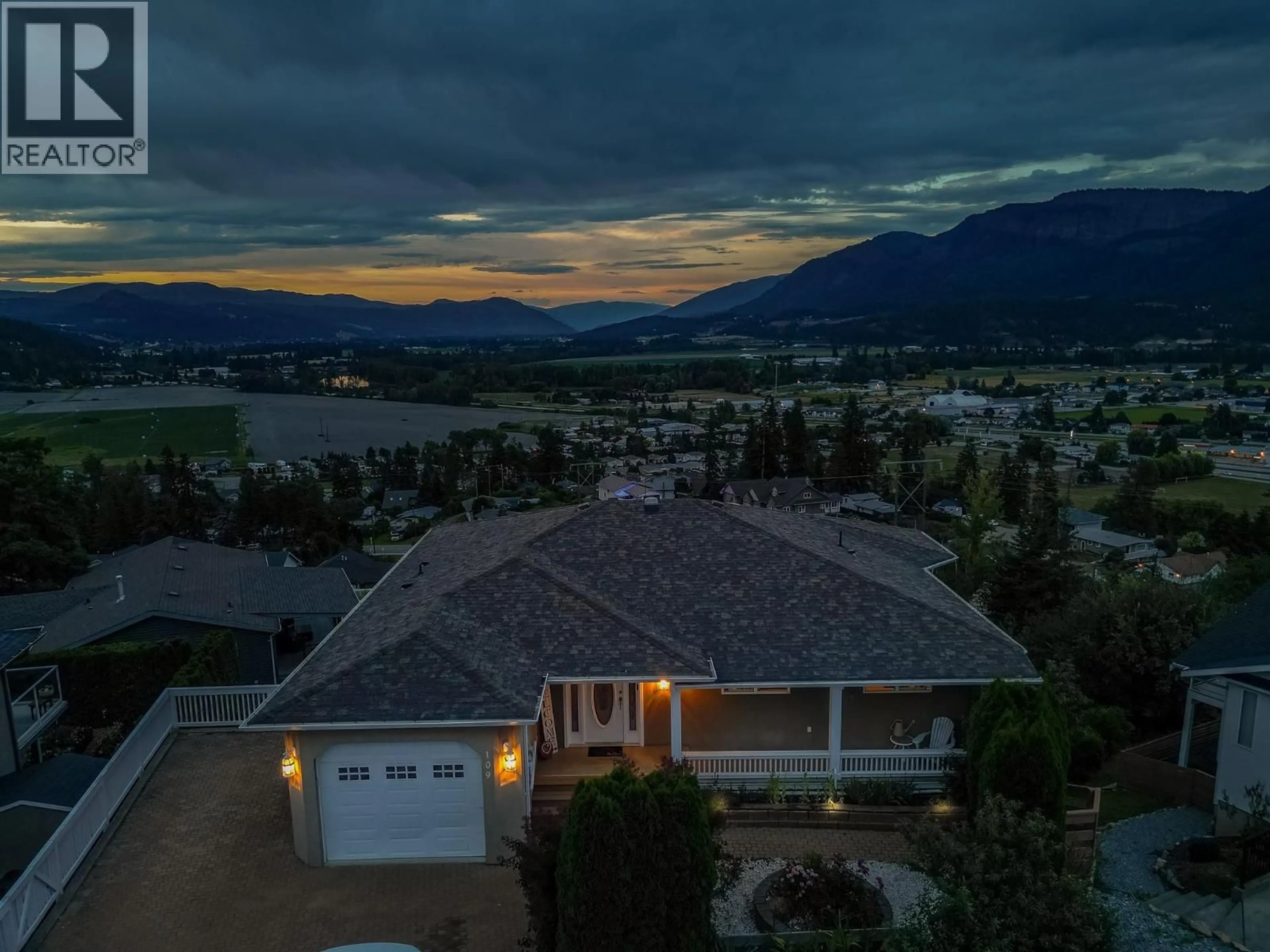 A pic from outside/outdoor area/front of a property/back of a property/a pic from drone, mountain view for 109 REVEL CRESCENT, Enderby British Columbia V4Y4B8