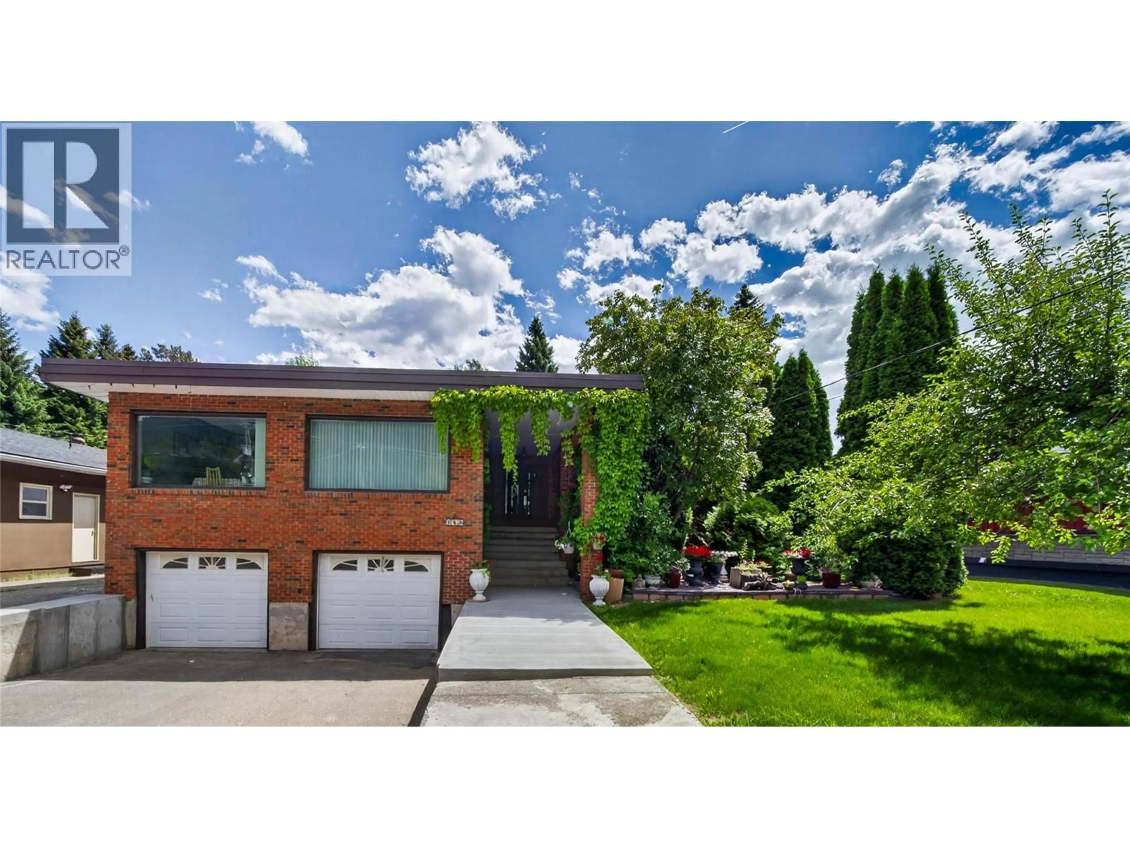 Home with brick exterior material, street for 1698 MCKENZIE ROAD, Fernie British Columbia V0B1M5