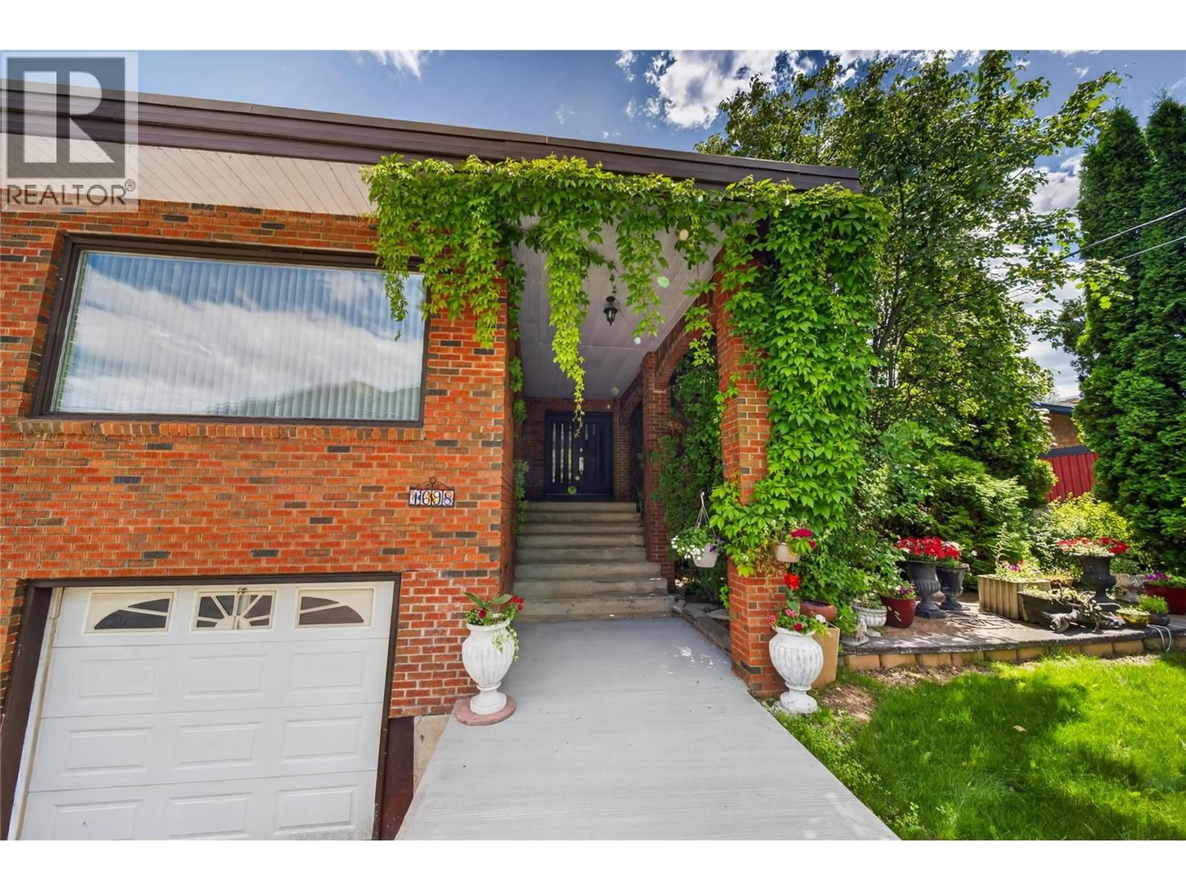 Home with brick exterior material, street for 1698 MCKENZIE ROAD, Fernie British Columbia V0B1M5