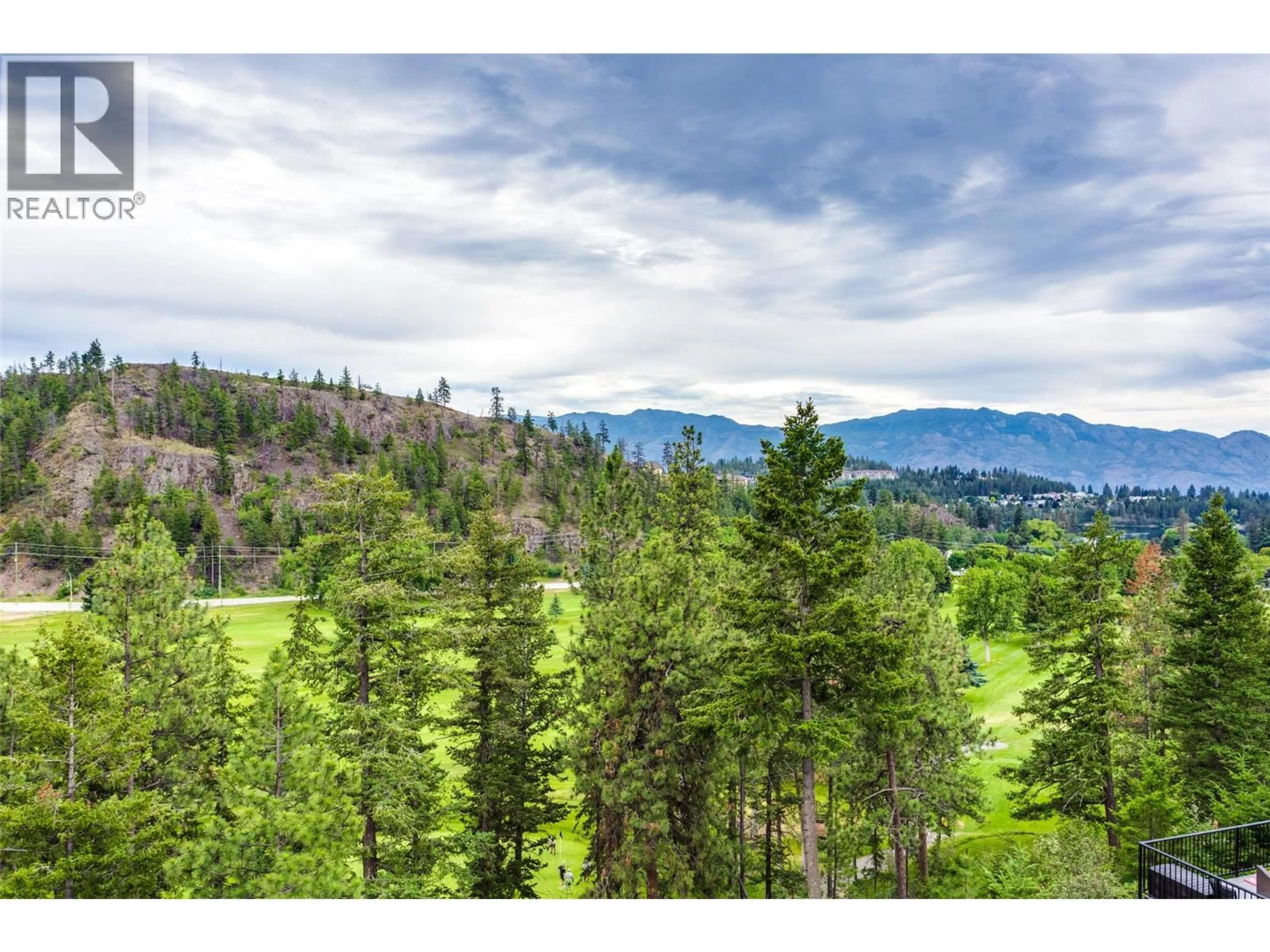 A pic from outside/outdoor area/front of a property/back of a property/a pic from drone, forest/trees view for 302 - 2470 TUSCANY DRIVE, West Kelowna British Columbia V4T3G8