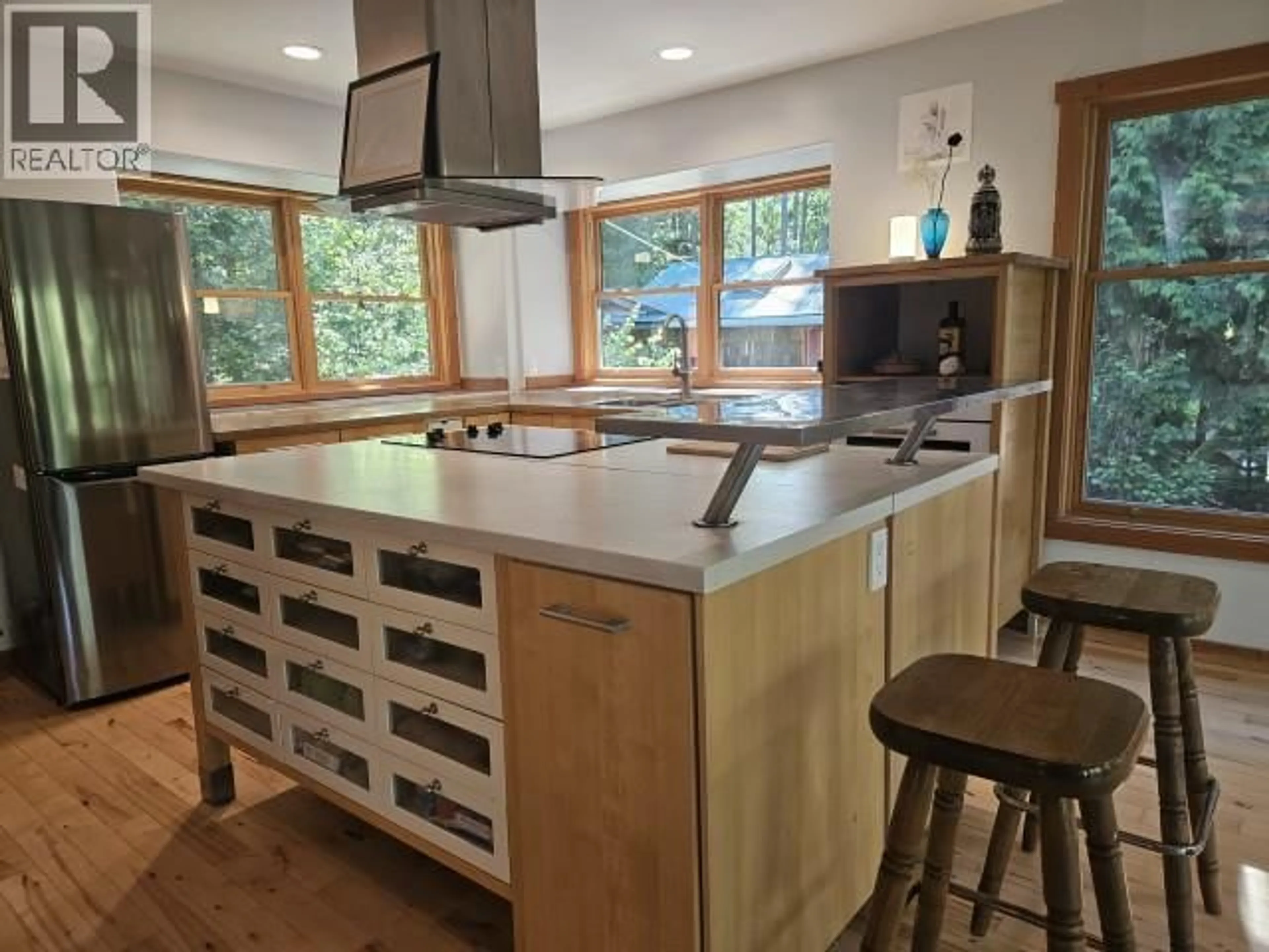 Contemporary kitchen, wood/laminate floor for 218 CLARK ROAD, Burton British Columbia V0G1E0