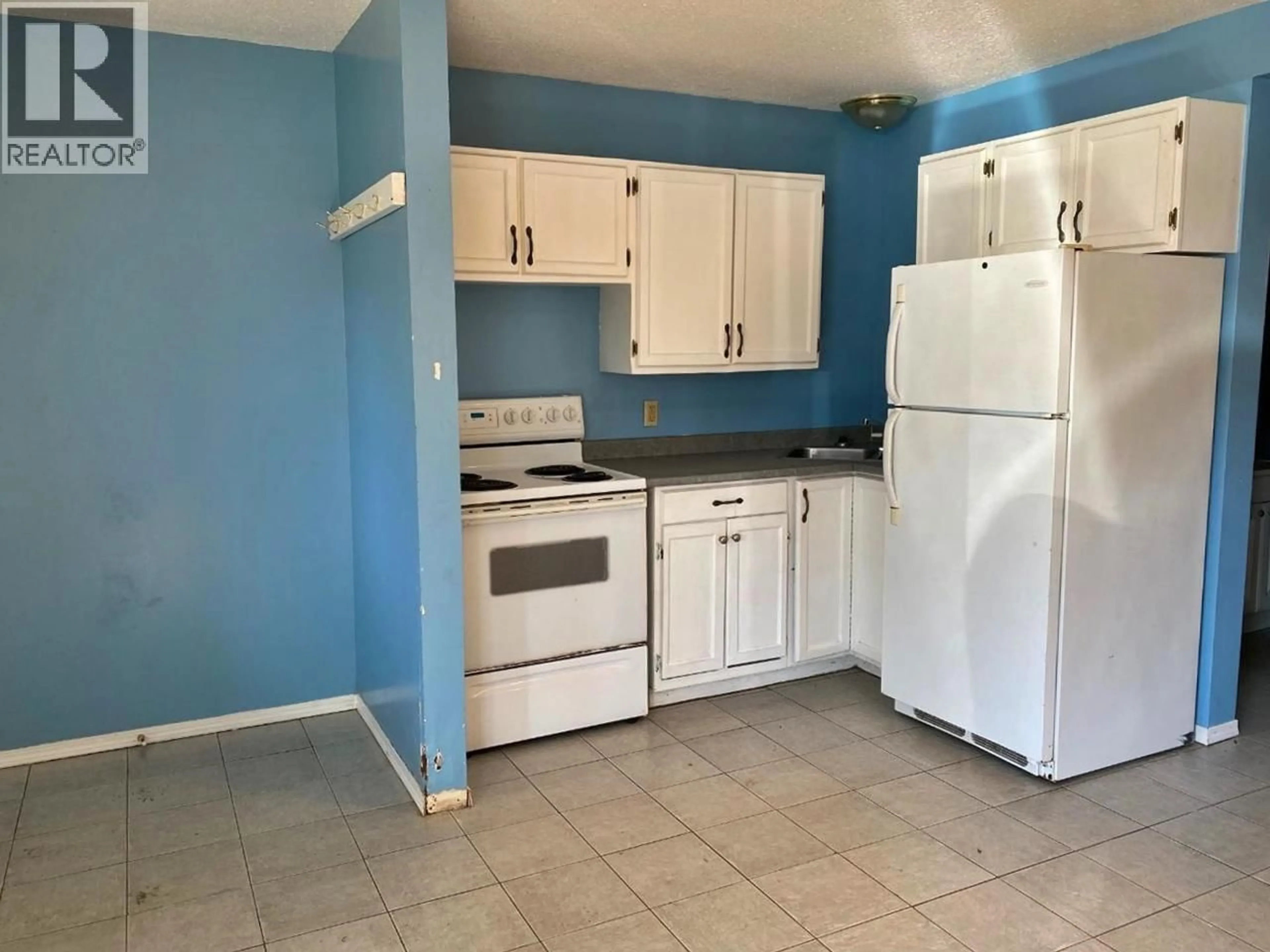 Standard kitchen, ceramic/tile floor for 405 DESFOSSES ROAD, Clearwater British Columbia V0E1N1