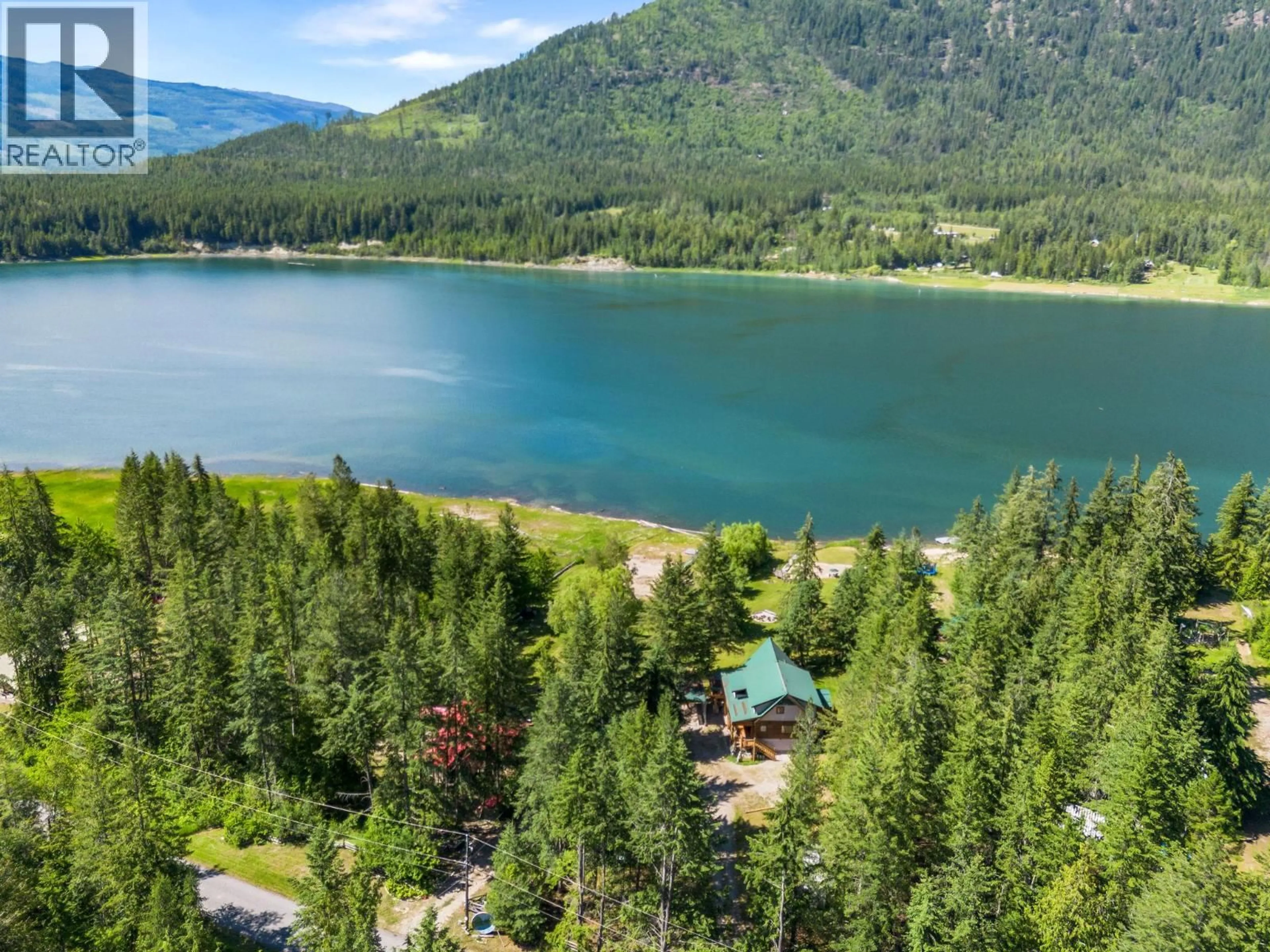 A pic from outside/outdoor area/front of a property/back of a property/a pic from drone, water/lake/river/ocean view for 3866 ROCK ISLAND ROAD, Nakusp British Columbia V0G1R1