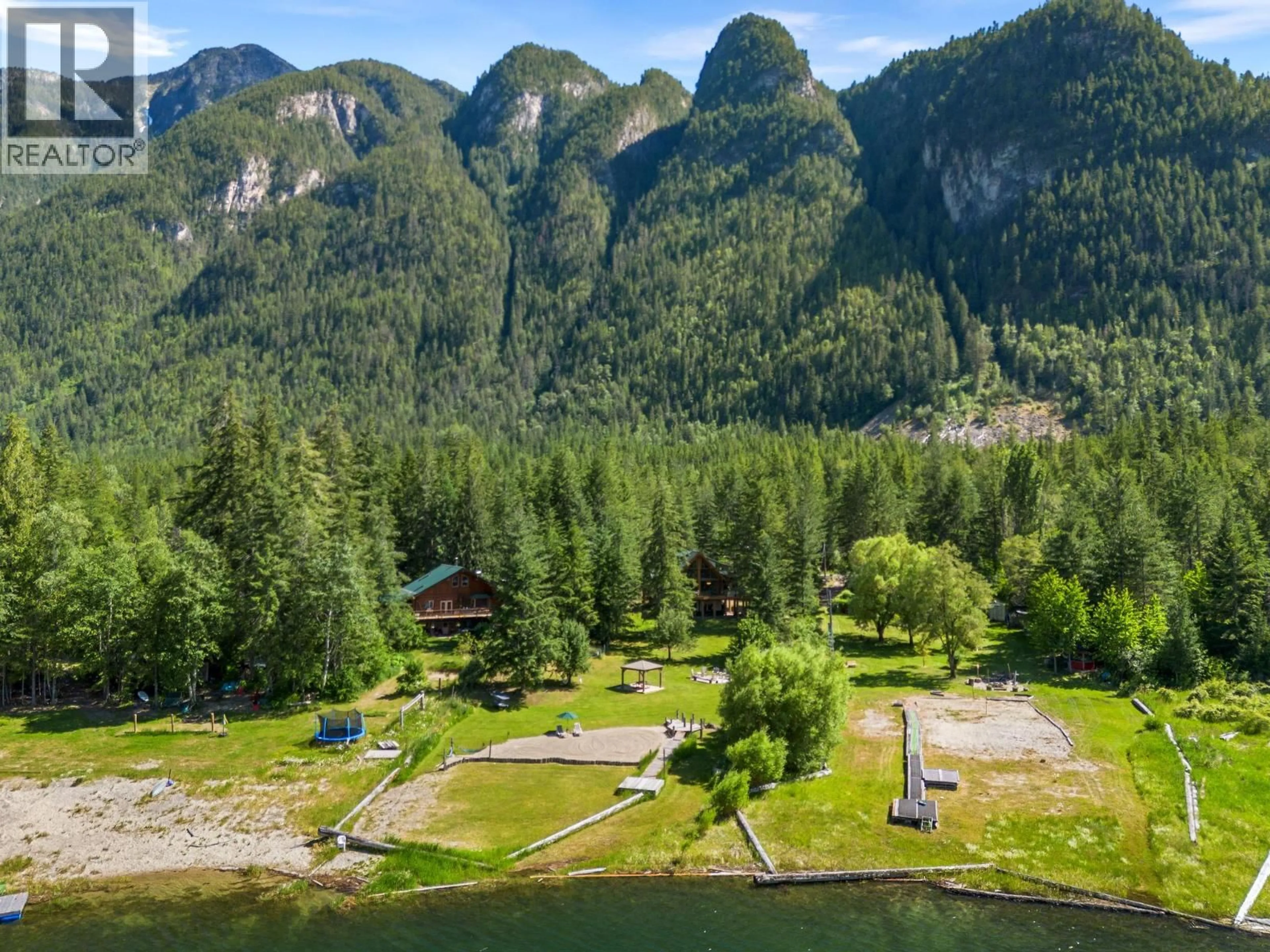 A pic from outside/outdoor area/front of a property/back of a property/a pic from drone, water/lake/river/ocean view for 3866 ROCK ISLAND ROAD, Nakusp British Columbia V0G1R1