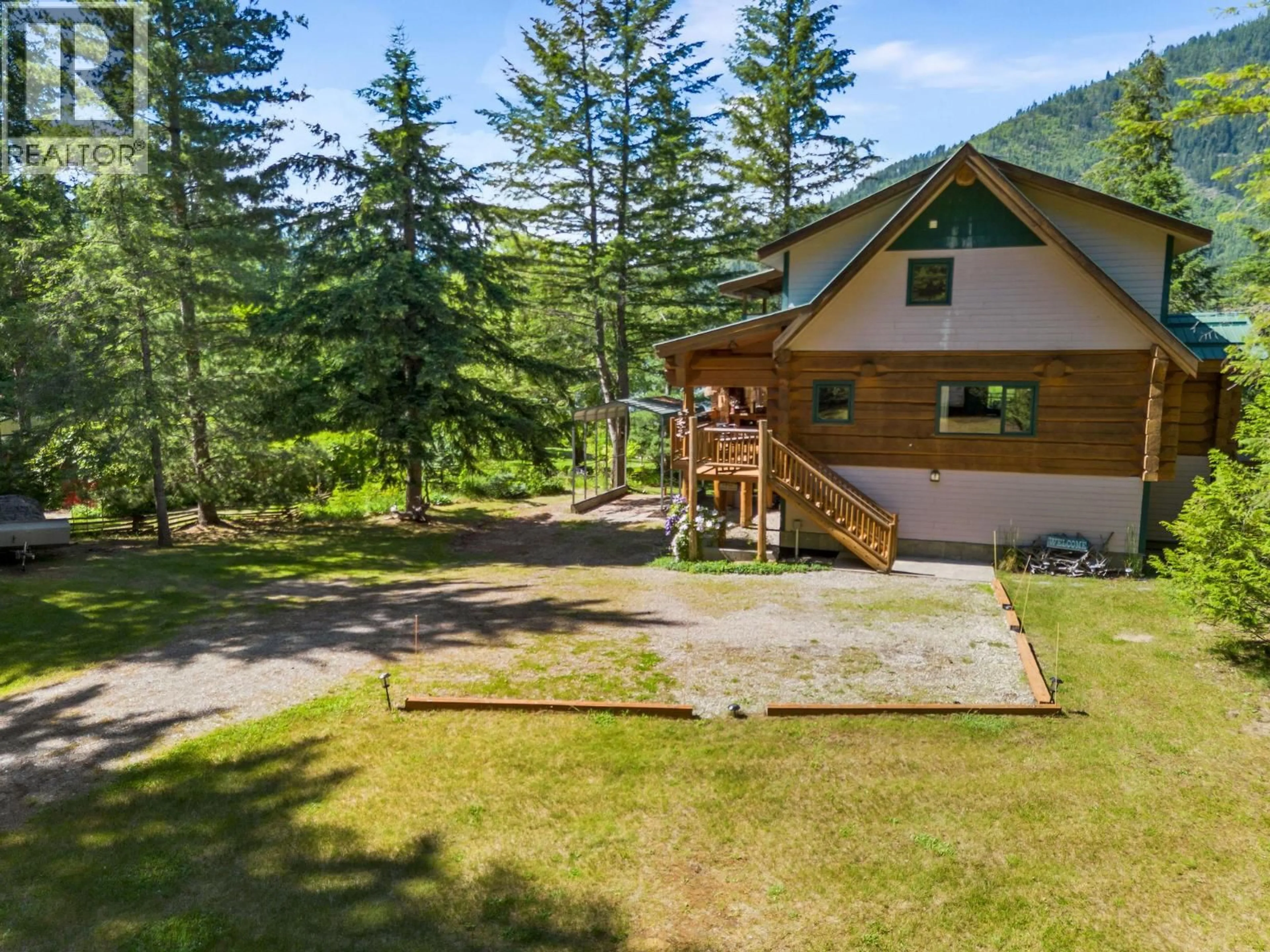 A pic from outside/outdoor area/front of a property/back of a property/a pic from drone, mountain view for 3866 ROCK ISLAND ROAD, Nakusp British Columbia V0G1R1