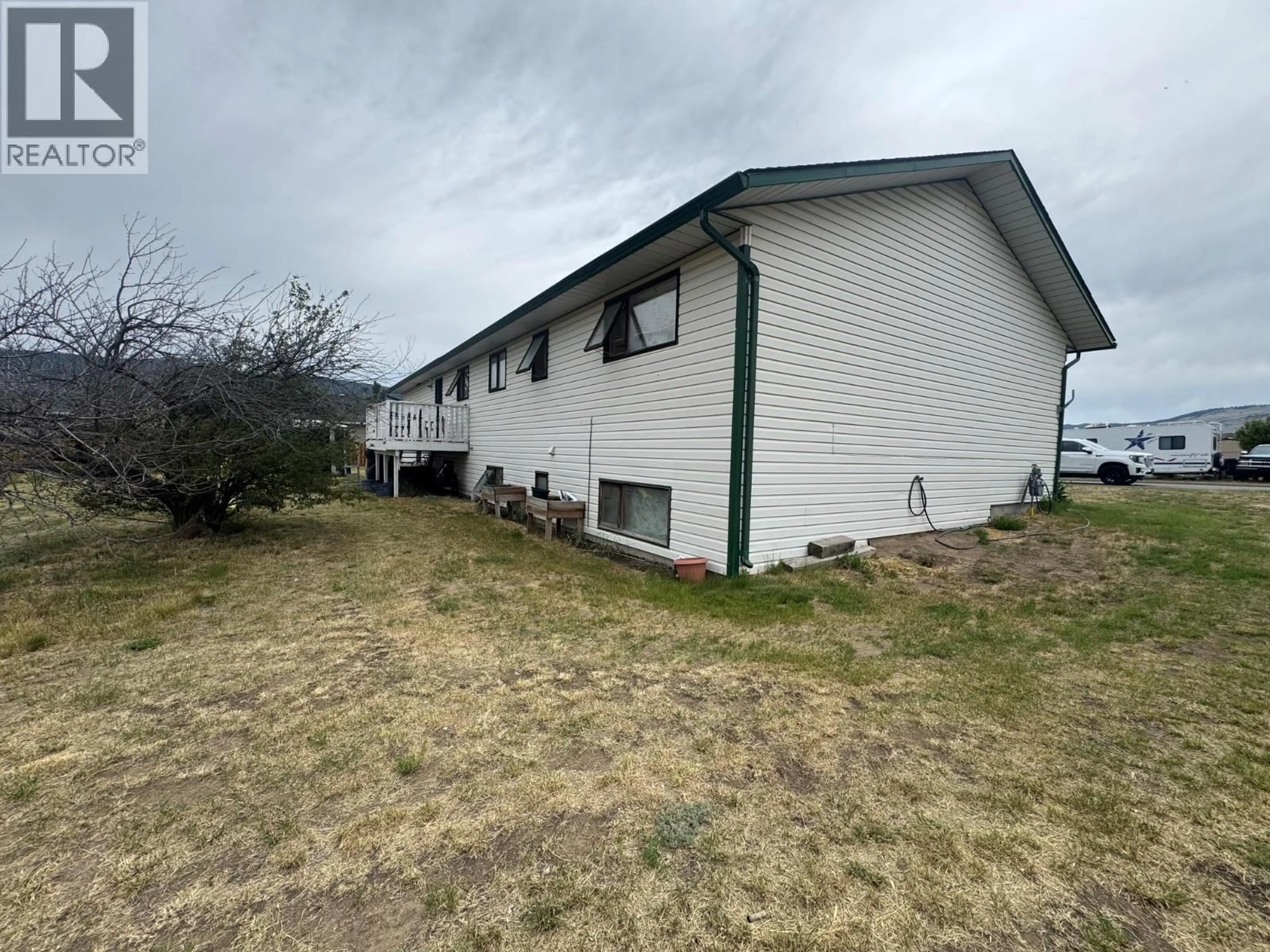 A pic from outside/outdoor area/front of a property/back of a property/a pic from drone, building for 1501 BANN STREET, Merritt British Columbia V1K1P7