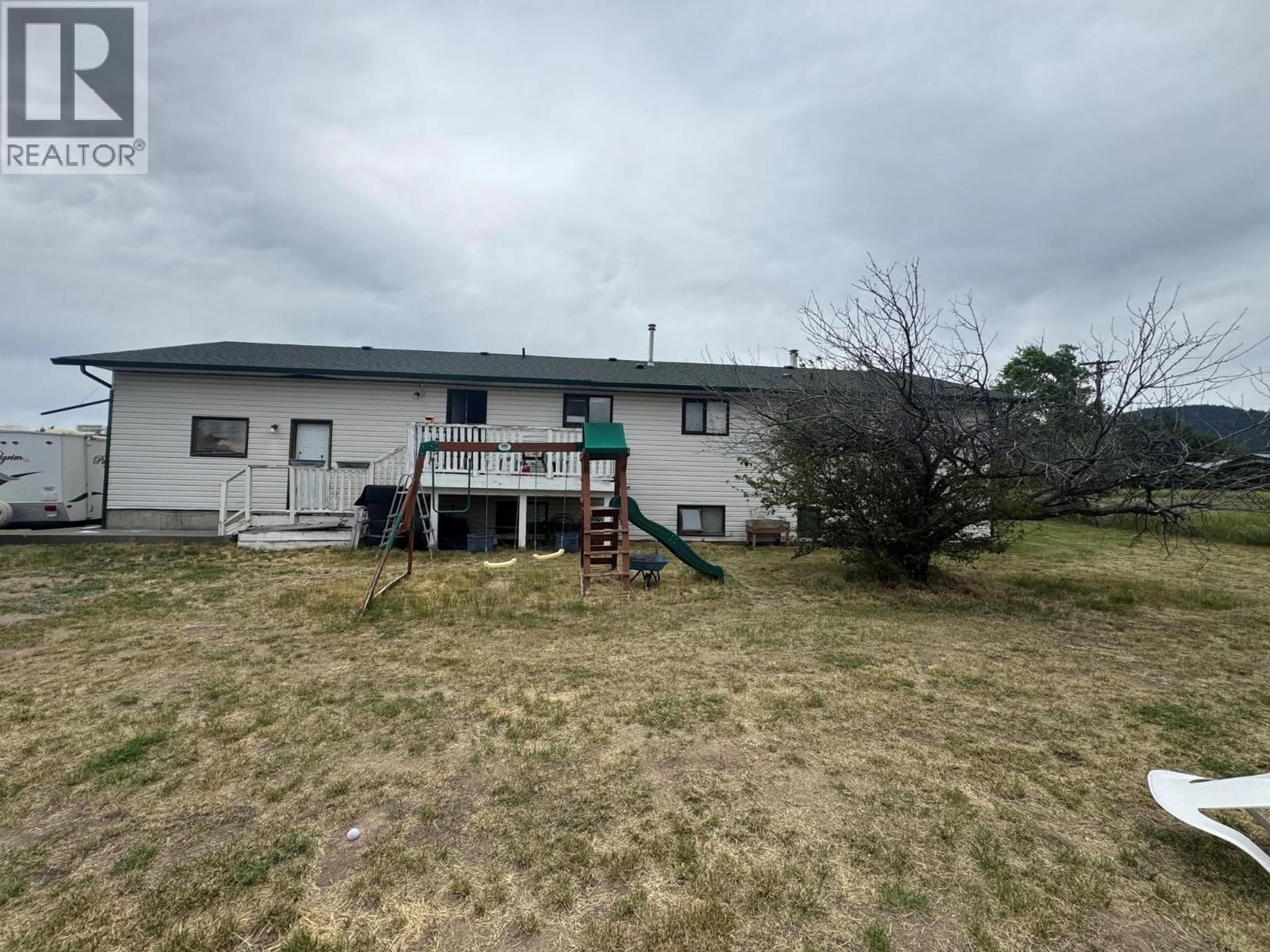 A pic from outside/outdoor area/front of a property/back of a property/a pic from drone, building for 1501 BANN STREET, Merritt British Columbia V1K1P7