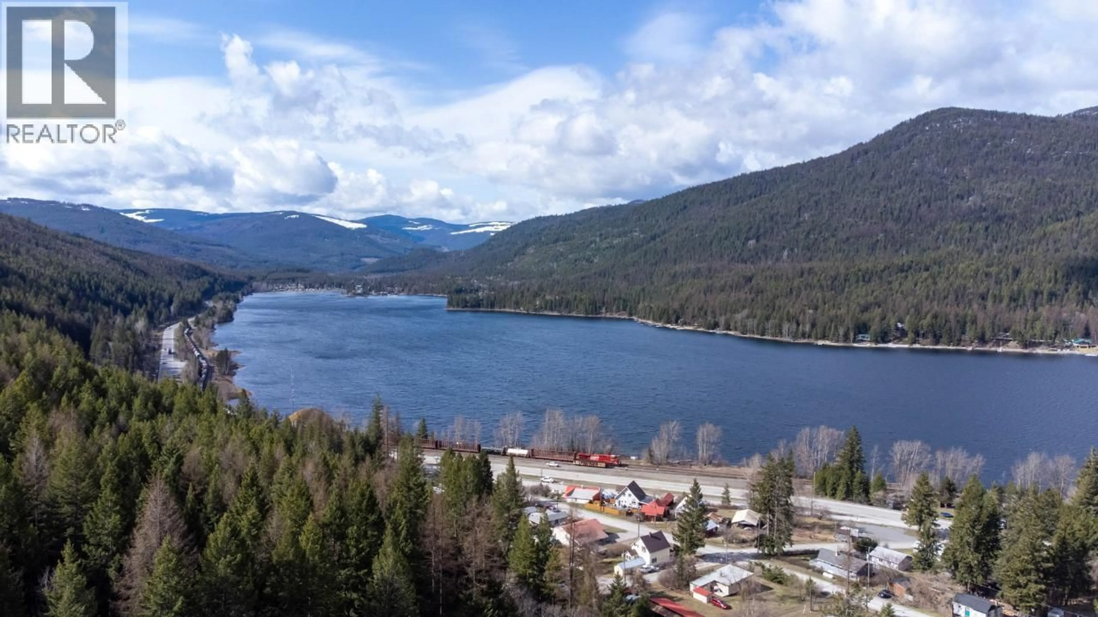 A pic from outside/outdoor area/front of a property/back of a property/a pic from drone, water/lake/river/ocean view for 1 - 3284 QUEENS AVENUE, Moyie British Columbia V0B2A0