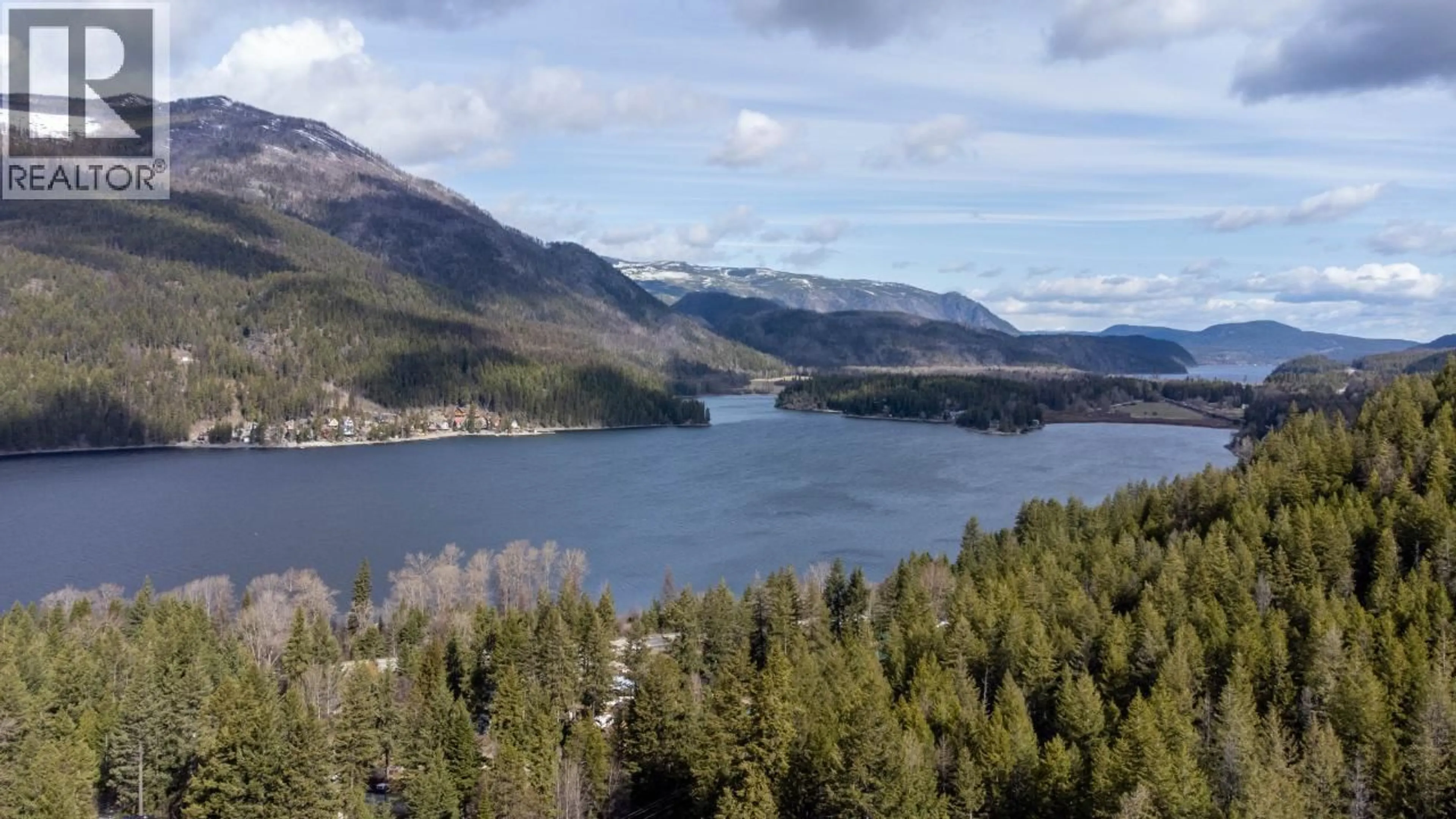 A pic from outside/outdoor area/front of a property/back of a property/a pic from drone, water/lake/river/ocean view for 1 - 3284 QUEENS AVENUE, Moyie British Columbia V0B2A0