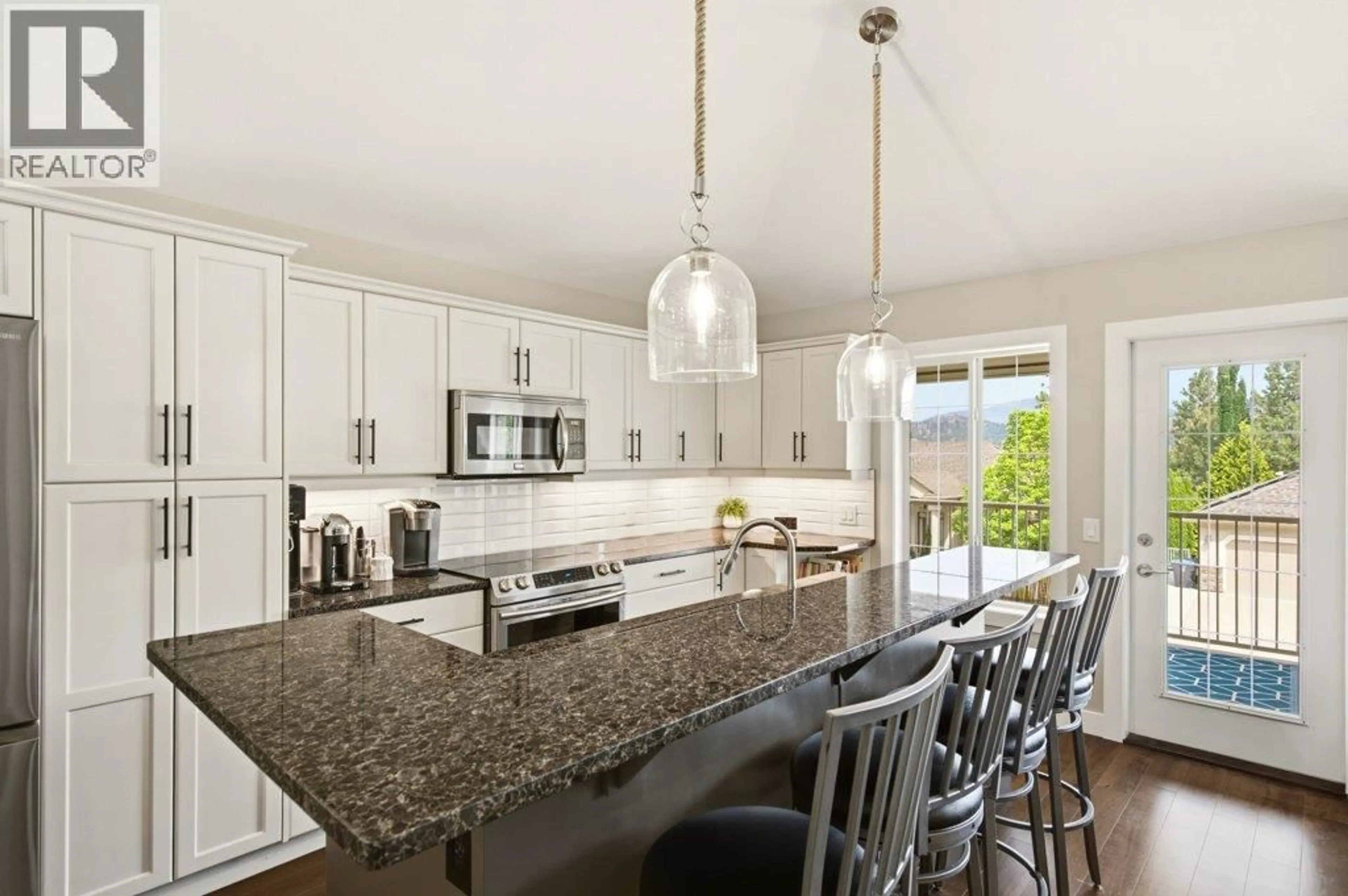 Open concept kitchen, ceramic/tile floor for 2109 BOWRON STREET, Kelowna British Columbia V1V2L6