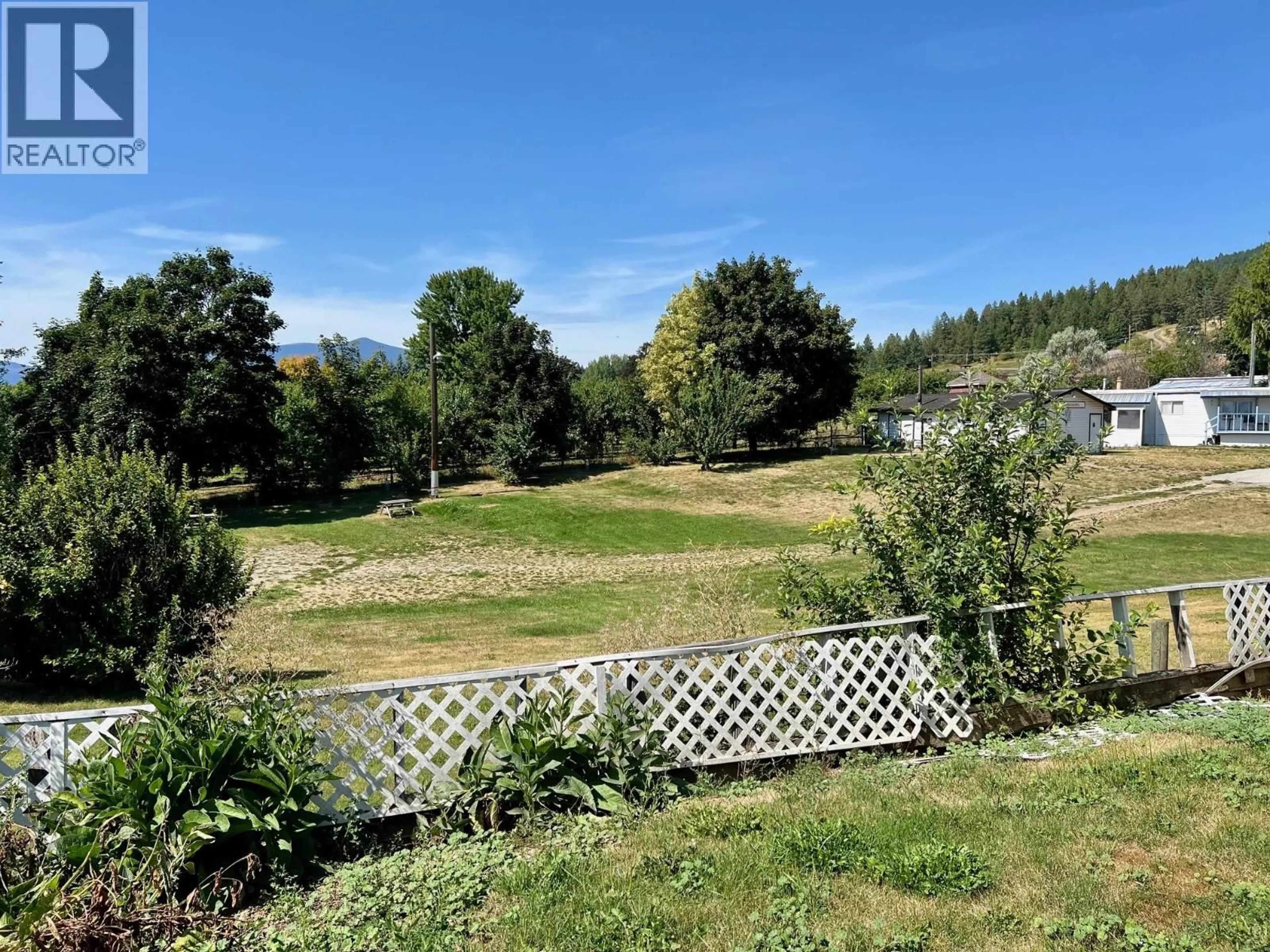 A pic from outside/outdoor area/front of a property/back of a property/a pic from drone, mountain view for 11 - 3003 3 HIGHWAY, Erickson British Columbia V0B1G1