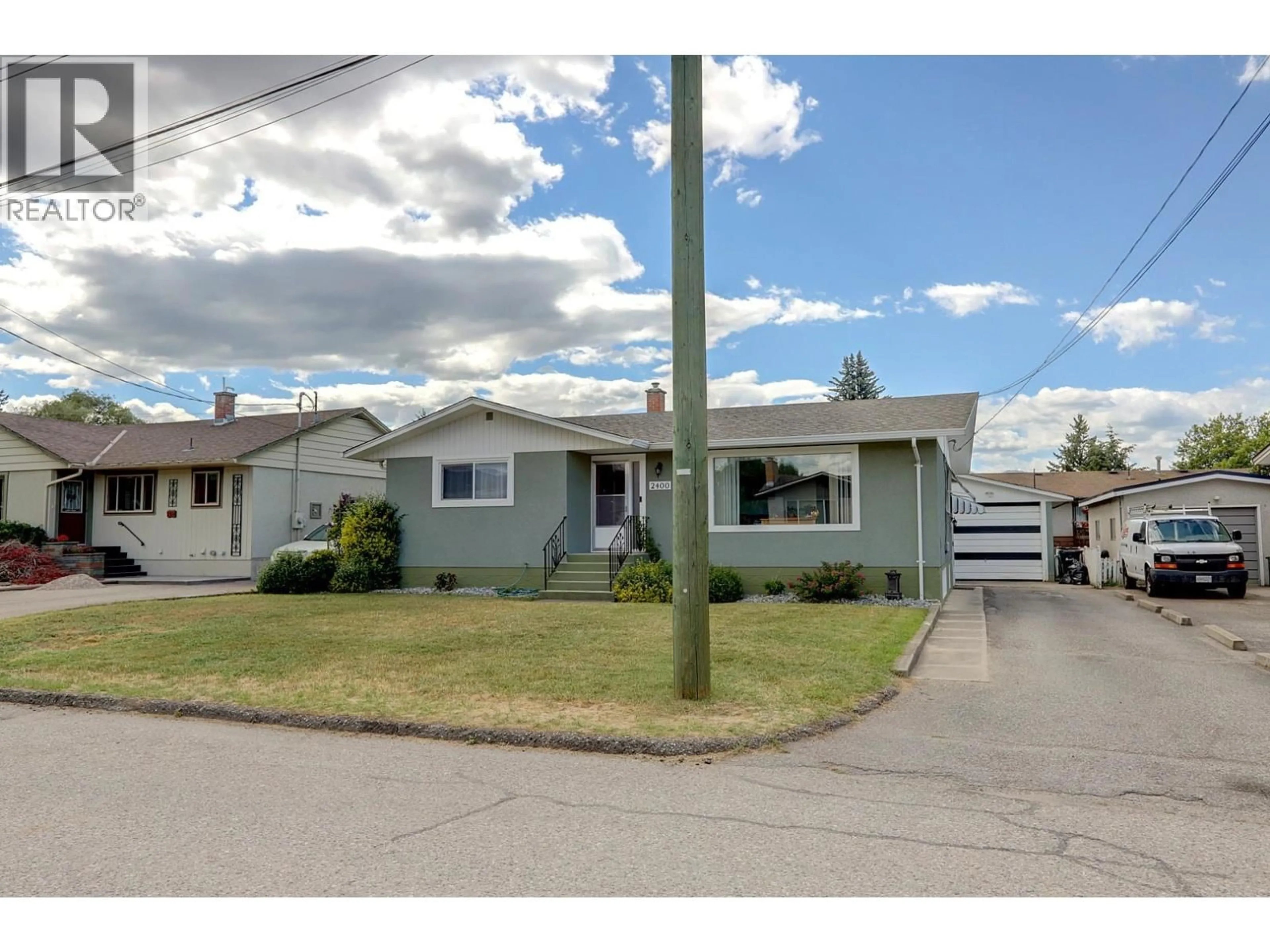 Home with vinyl exterior material, street for 2400 44 AVENUE, Vernon British Columbia V1T3M1