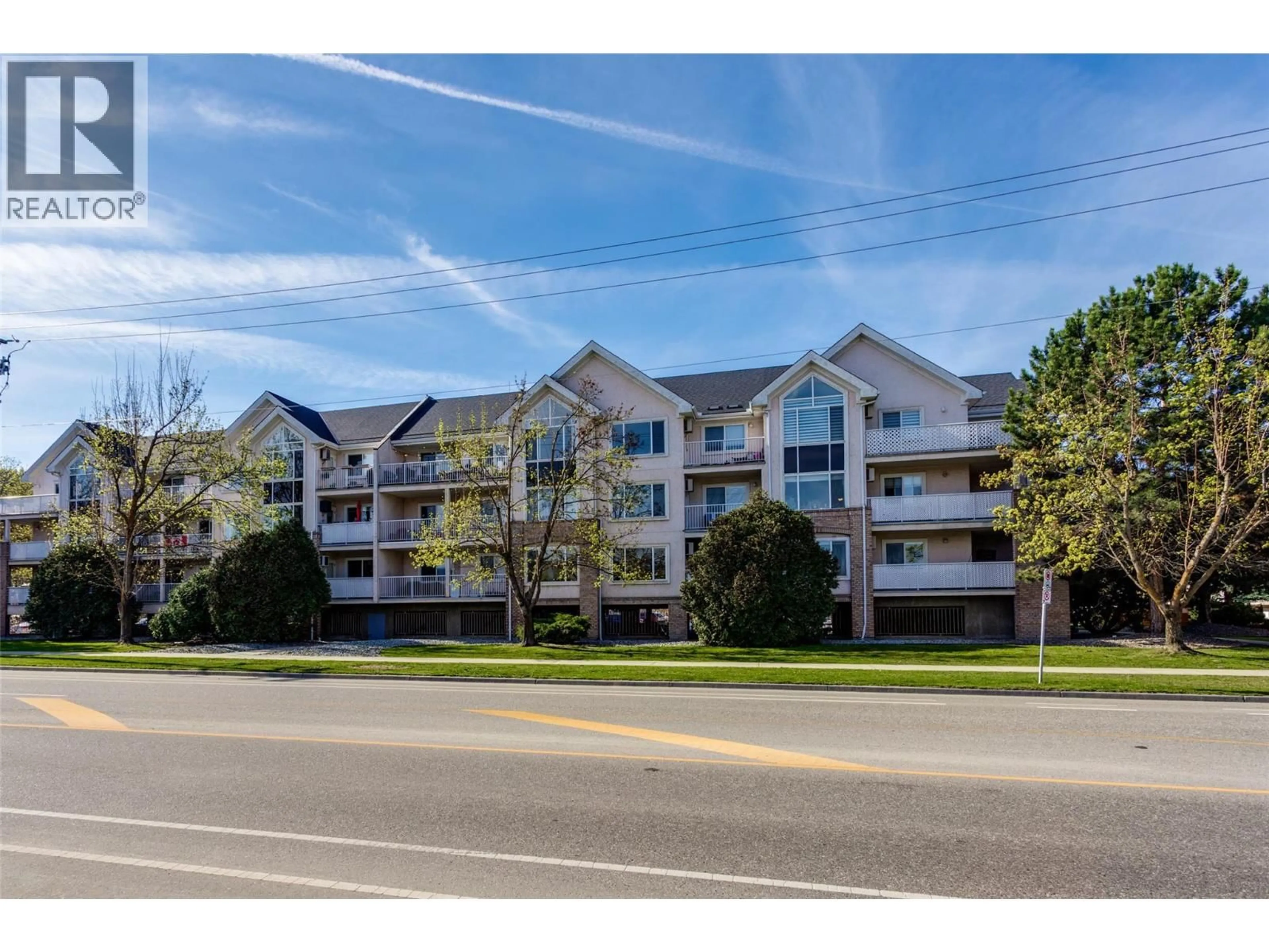 A pic from outside/outdoor area/front of a property/back of a property/a pic from drone, unknown for 110 - 400 SUTTON CRESCENT, Kelowna British Columbia V1V1Y3