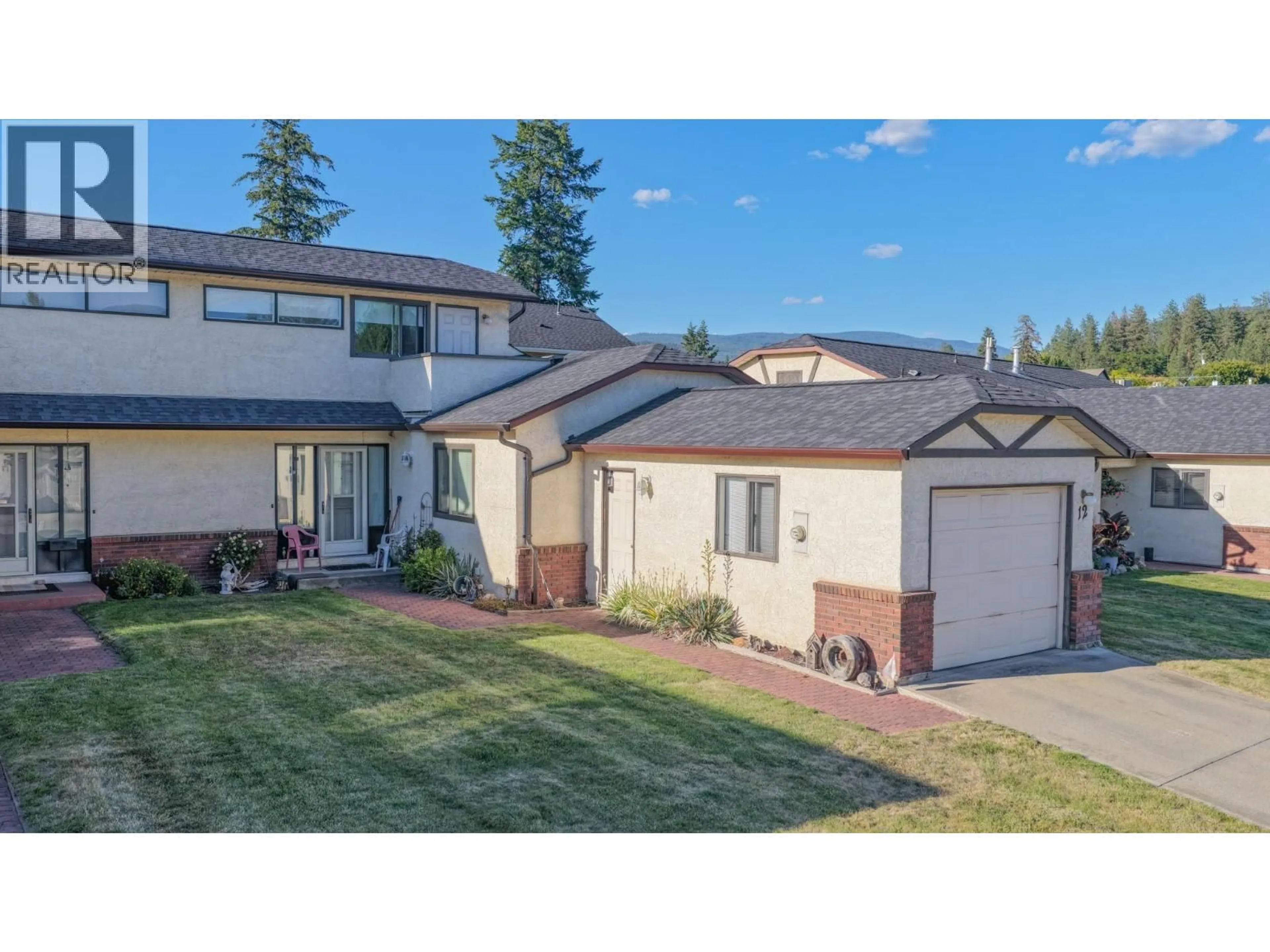 Home with vinyl exterior material, street for 12 - 4311 20 STREET, Vernon British Columbia V1T4E4