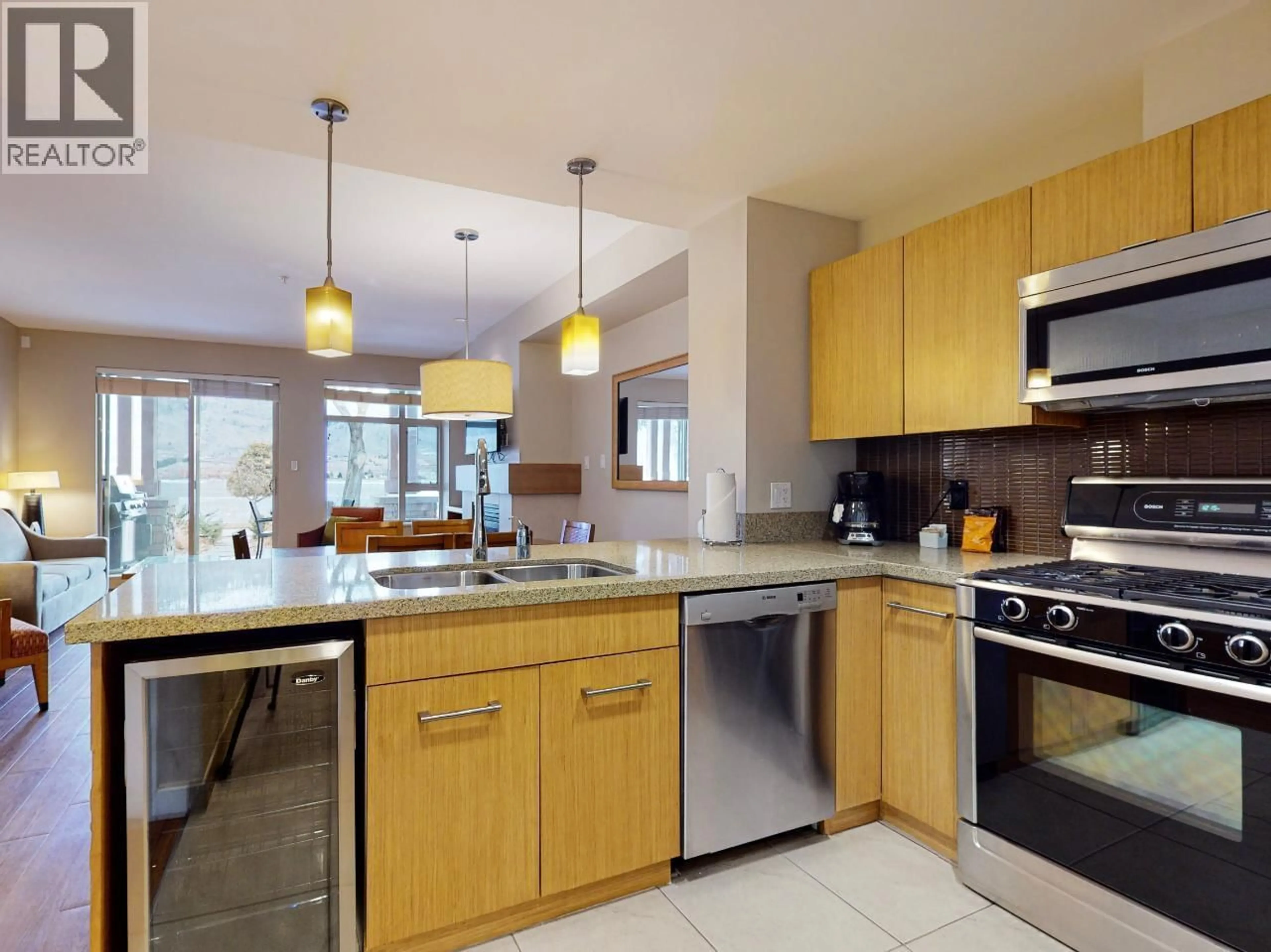 Open concept kitchen, ceramic/tile floor for 14 - 15 PARK PLACE, Osoyoos British Columbia V0H1V0
